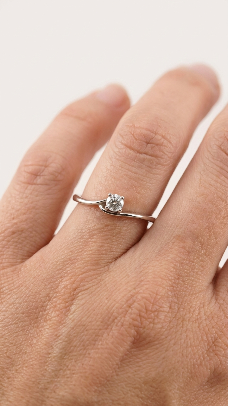 stark jewelers bespoke engagement solitaire ring collection on a model