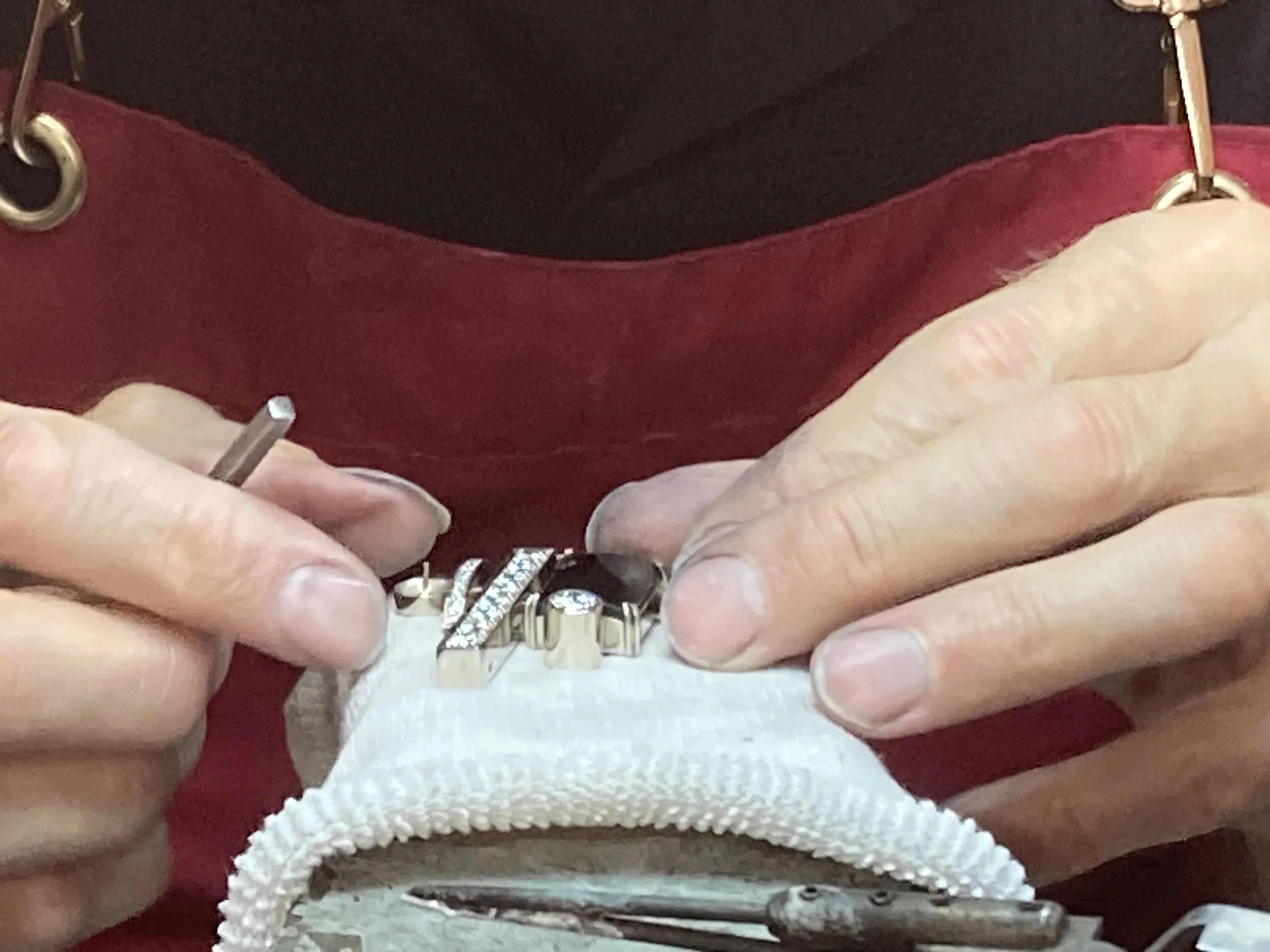 Master goldsmith Larry Stark handcrafting the modulated high jewelry pendant in our studio in Sacramento.