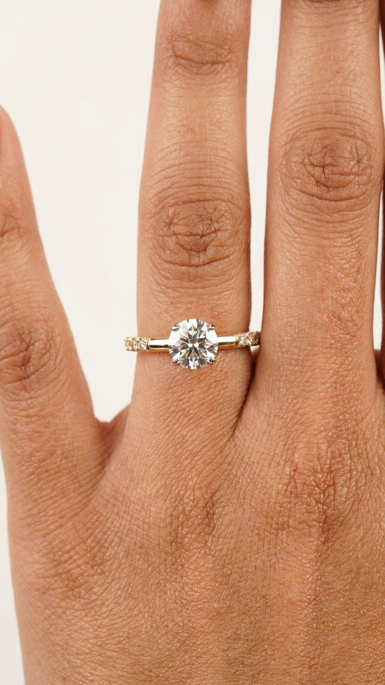 stark jewelers bespoke engagement solitaire ring collection on a model