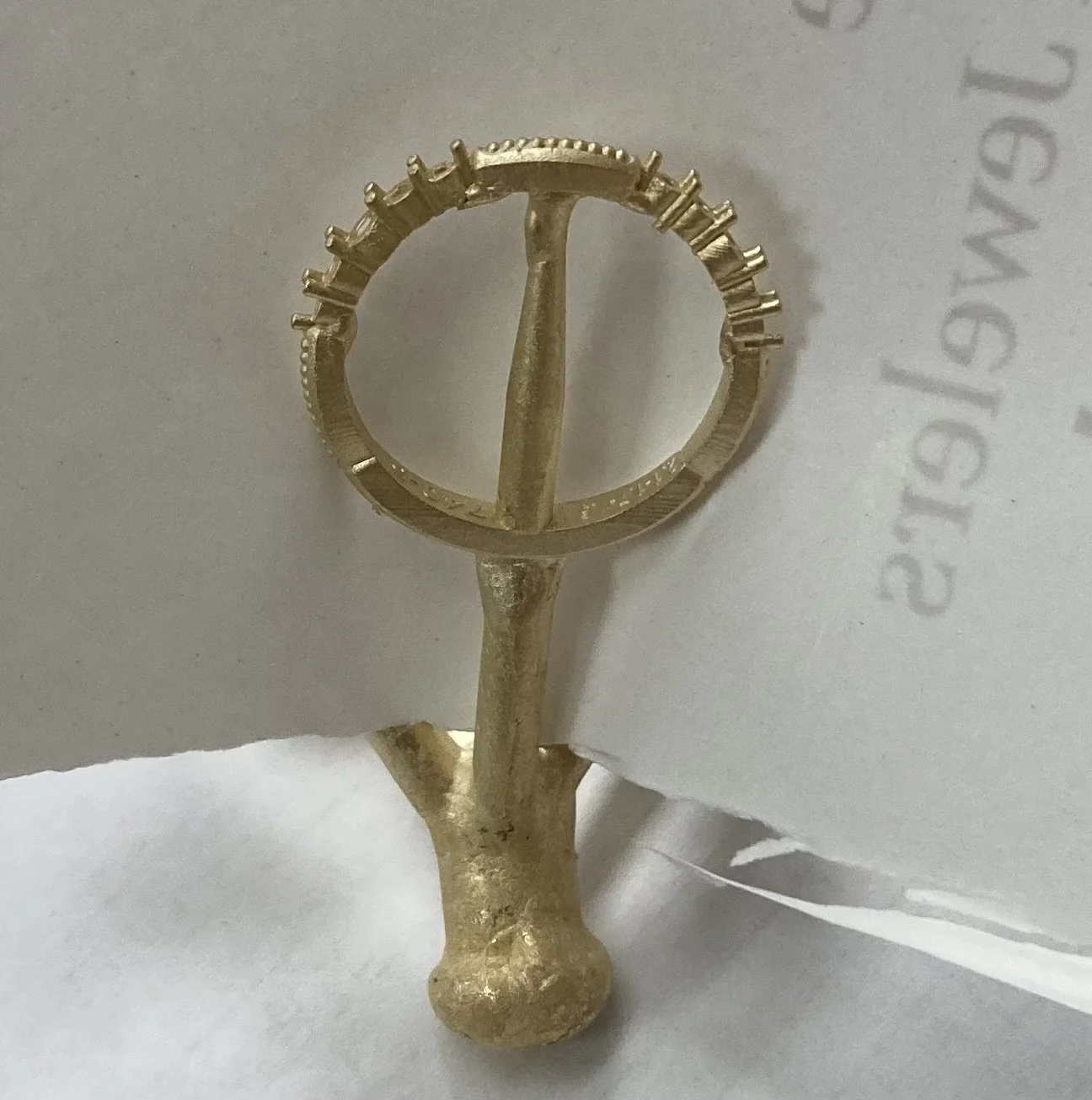 The Casting and Crafting: Once approved, the piece moves to the bench. It goes through the casting process before our master jewelers set the diamonds and polish the 18k yellow gold to a mirror finish iat stark Jewelers in Sacramento.