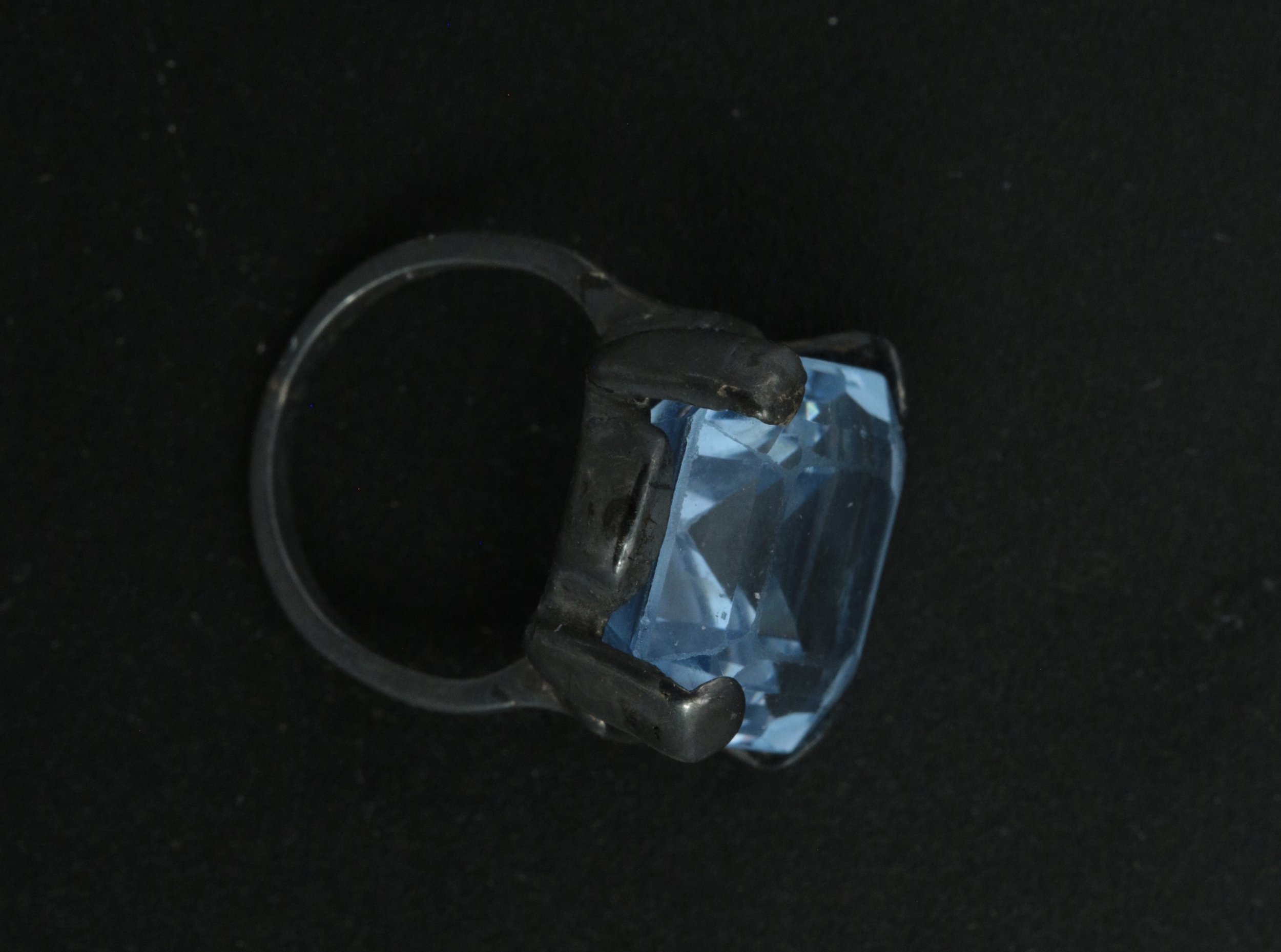 A completely oxidized silver ring with aquamarine stone before redesign at Stark Jewelers in Sacramento