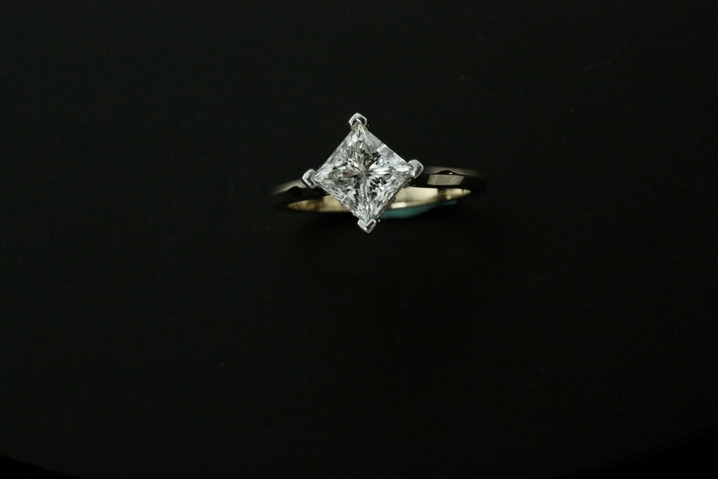 custom make 14k white gold diamond engagement ring designed and crafted by Stark Jewelers in Sacramento