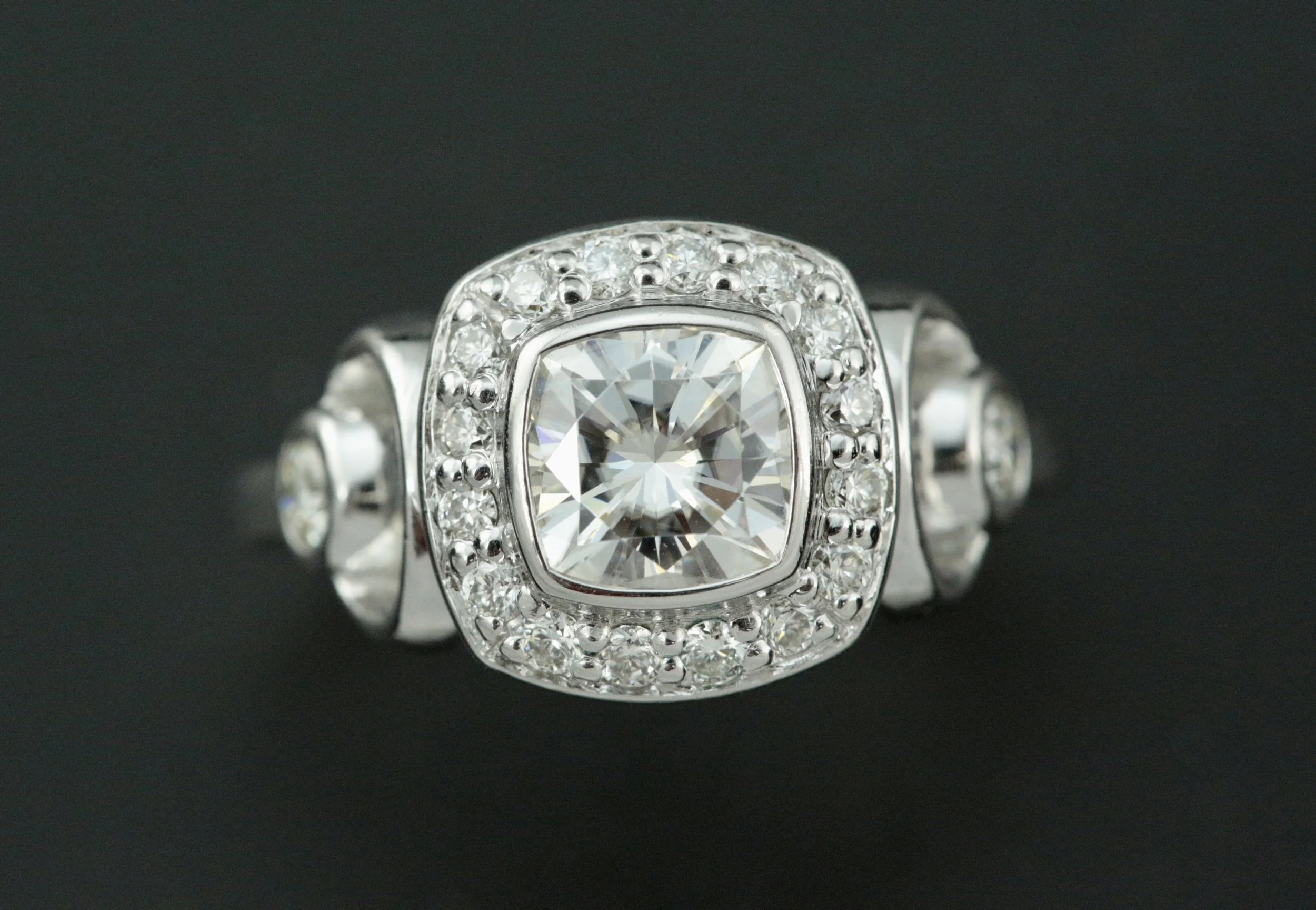 An preowned 14k white gold diamond engagement ring before custom redesign at Stark Jewelers located on Fair Oaks Blvd Sacramento