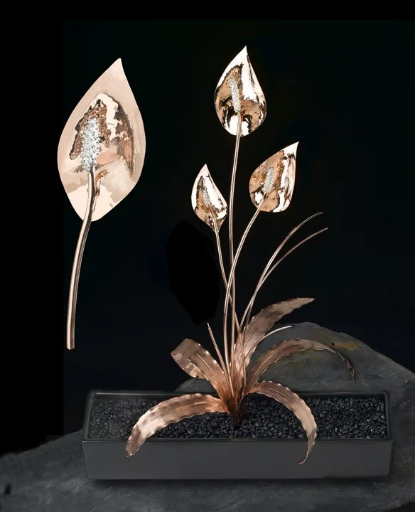 Handcrafted peace lily sculpture showcasing exceptional craftsmanship.

Includes one detachable brooch for versatile wear and display.