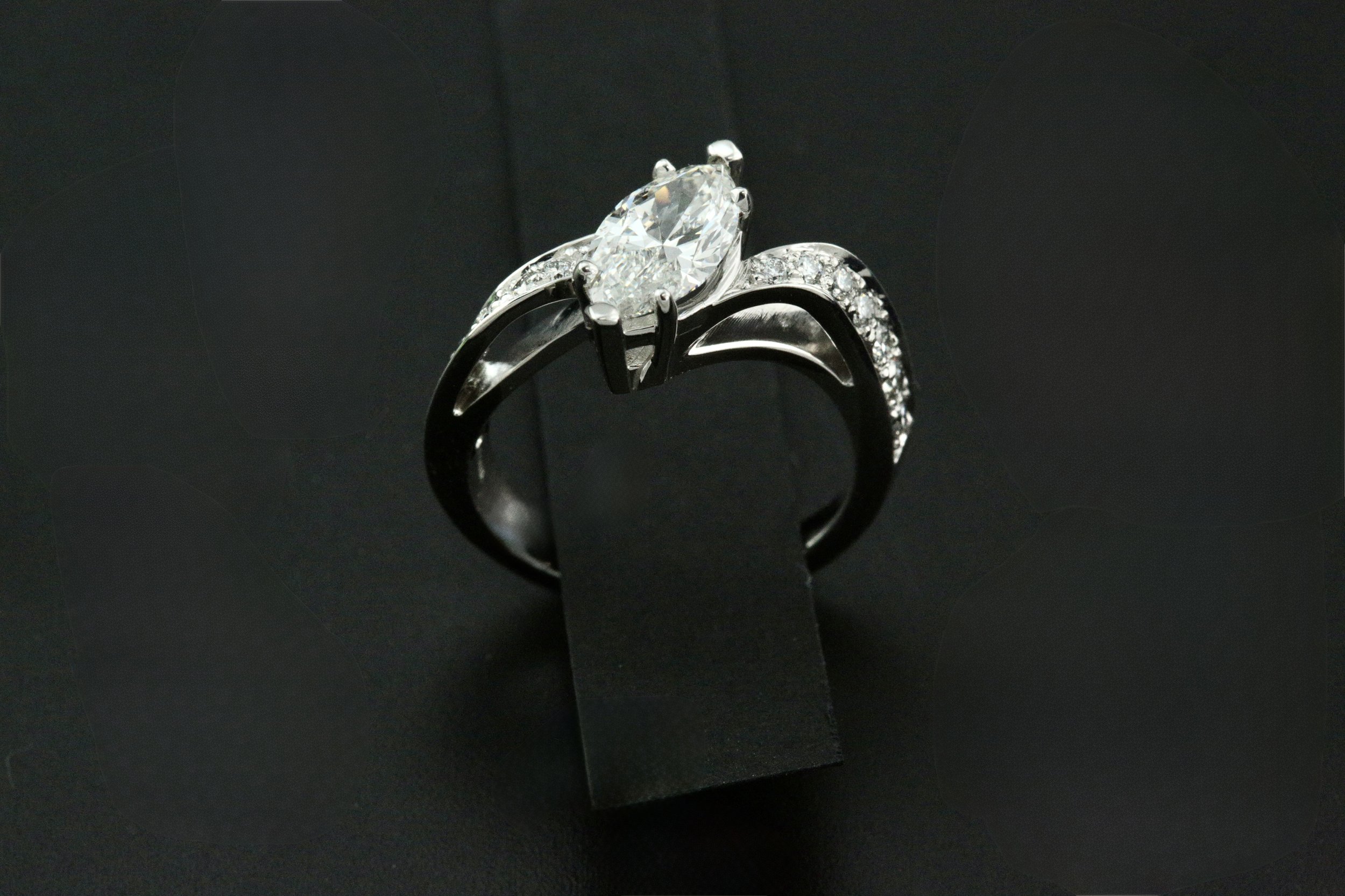 custom make 14k white gold natural diamond engagement ring designed and crafted by Stark Jewelers in Sacramento