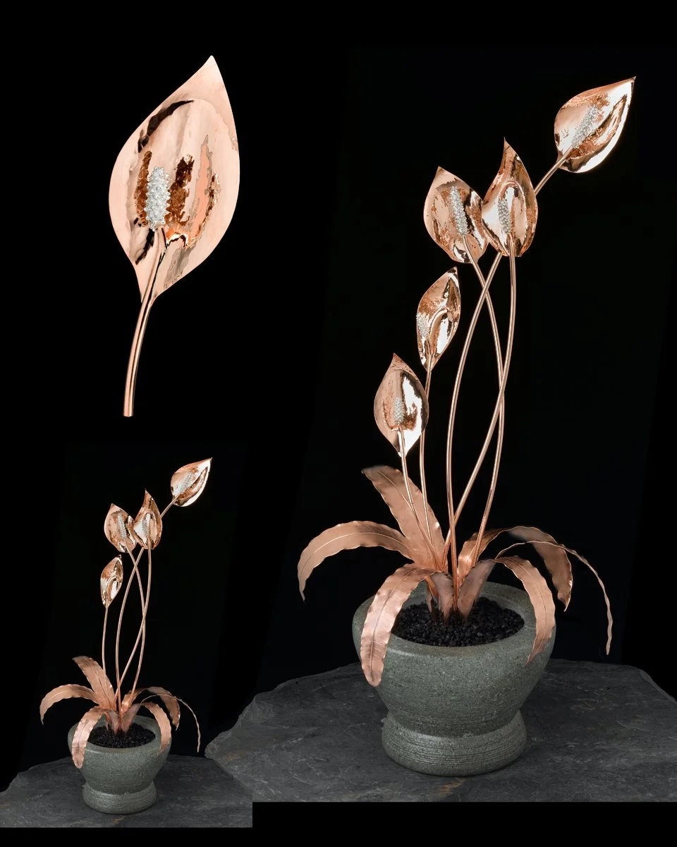 Handcrafted peace lily sculpture showcasing exceptional craftsmanship.

Includes once detachable brooch for versatile wear and display.