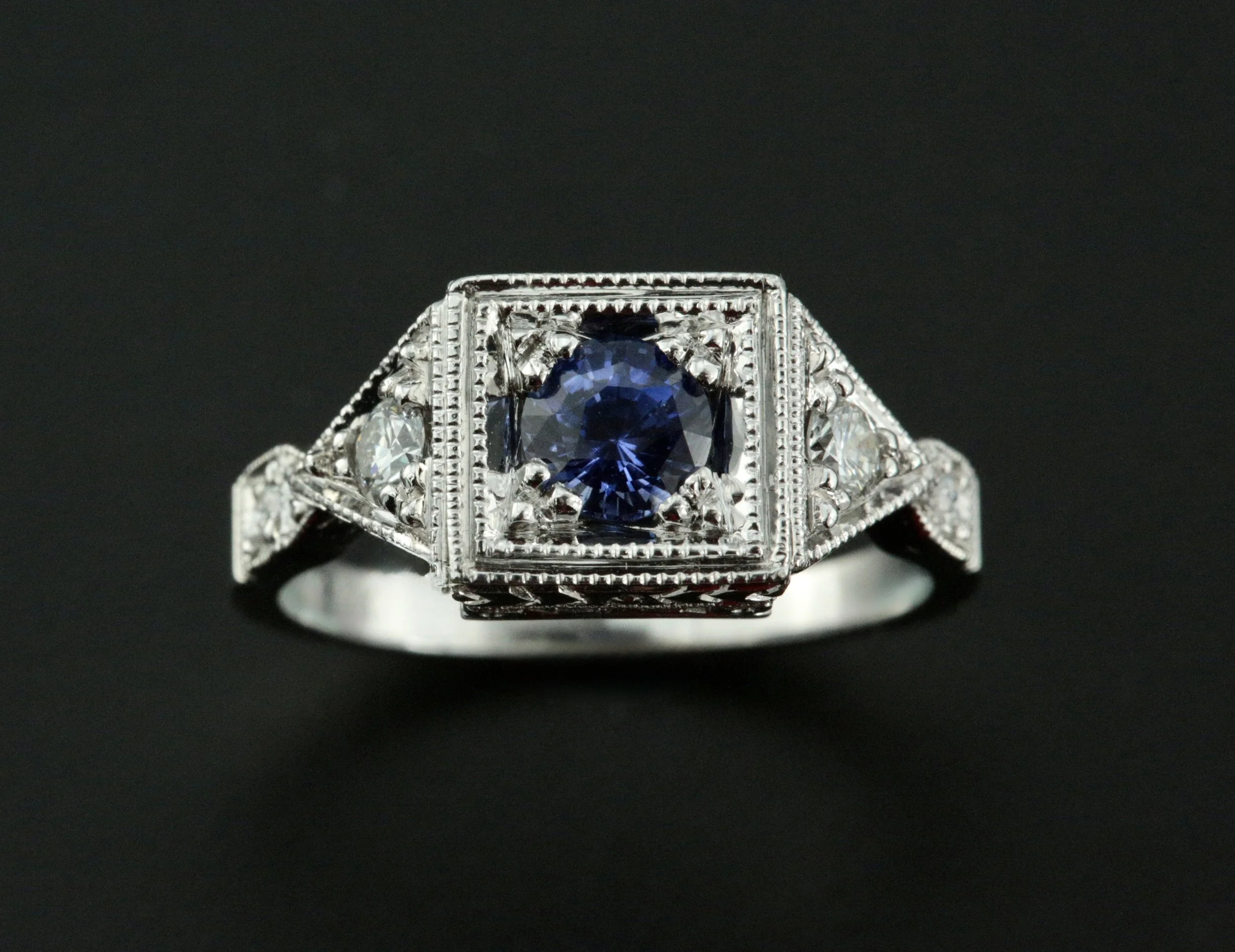 Dessu Sapphire Diamond Ring. 14K white gold ring 0.75 carats Sapphire and 0.28 carats Diamonds. Designed and meticulously handcrafted by the distinguished jewelry master, Larry Stark
