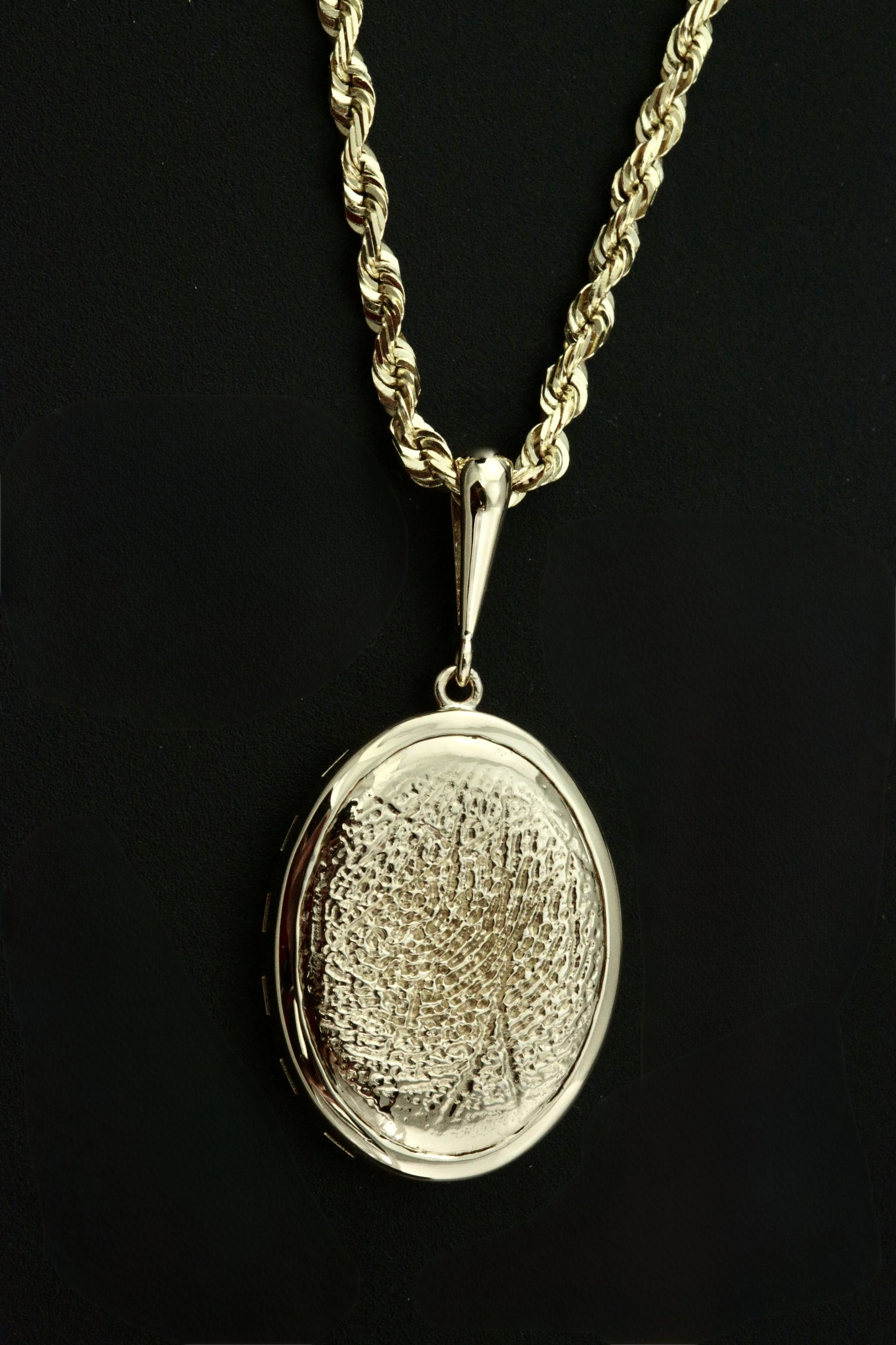 A custom made 14k  yellow gold pendant from a passed loving mother for her two daughters designed and crafted in Stark Jewelers in Sacramento