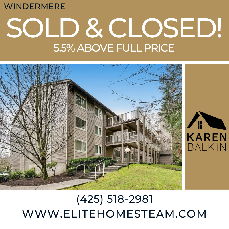 A multi-story apartment building with balconies and a well-maintained lawn, indicating a sold and closed real estate listing.