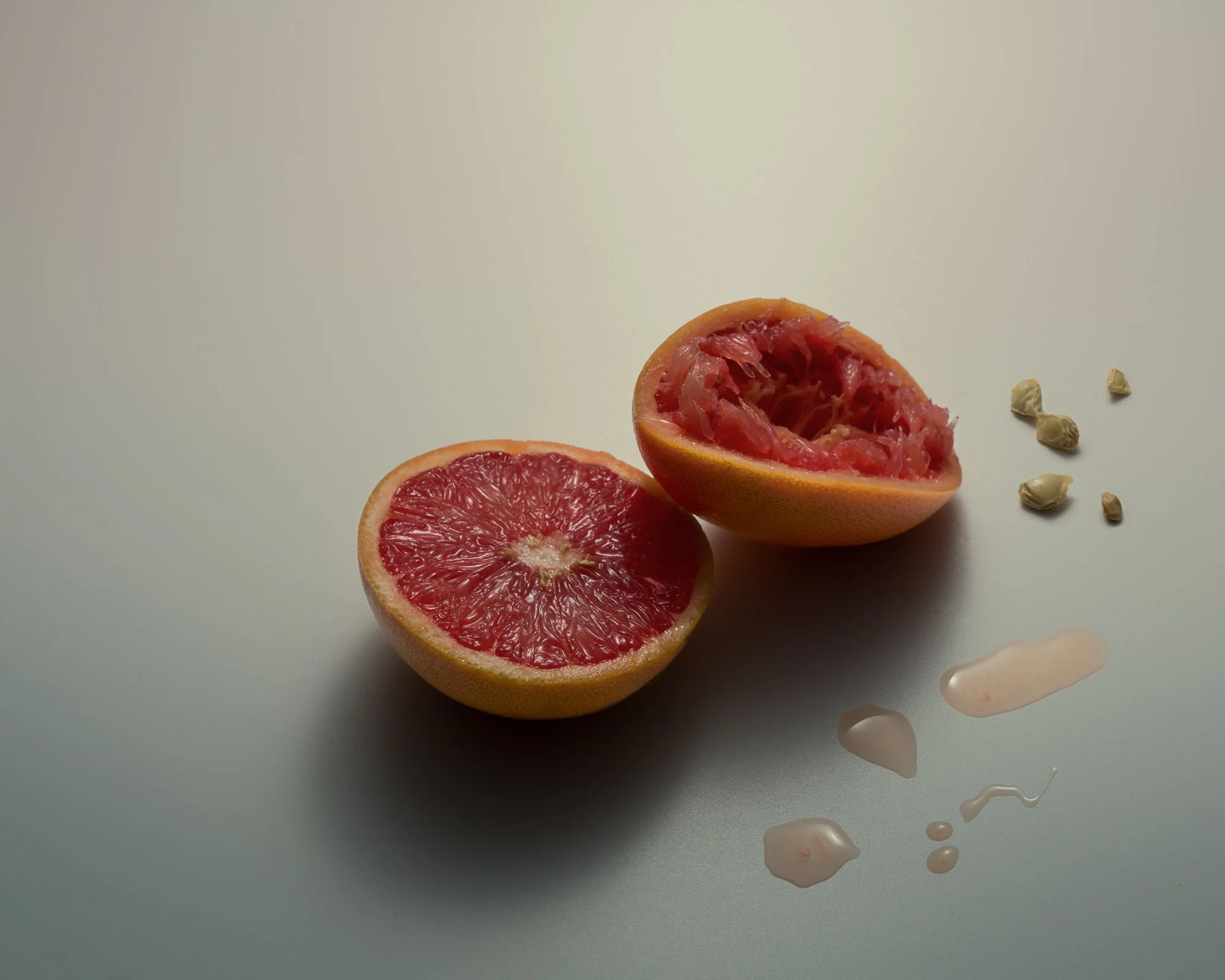 agrumi pompelmo arancione semi succo spremuta gocce fotografo food milano.jpg