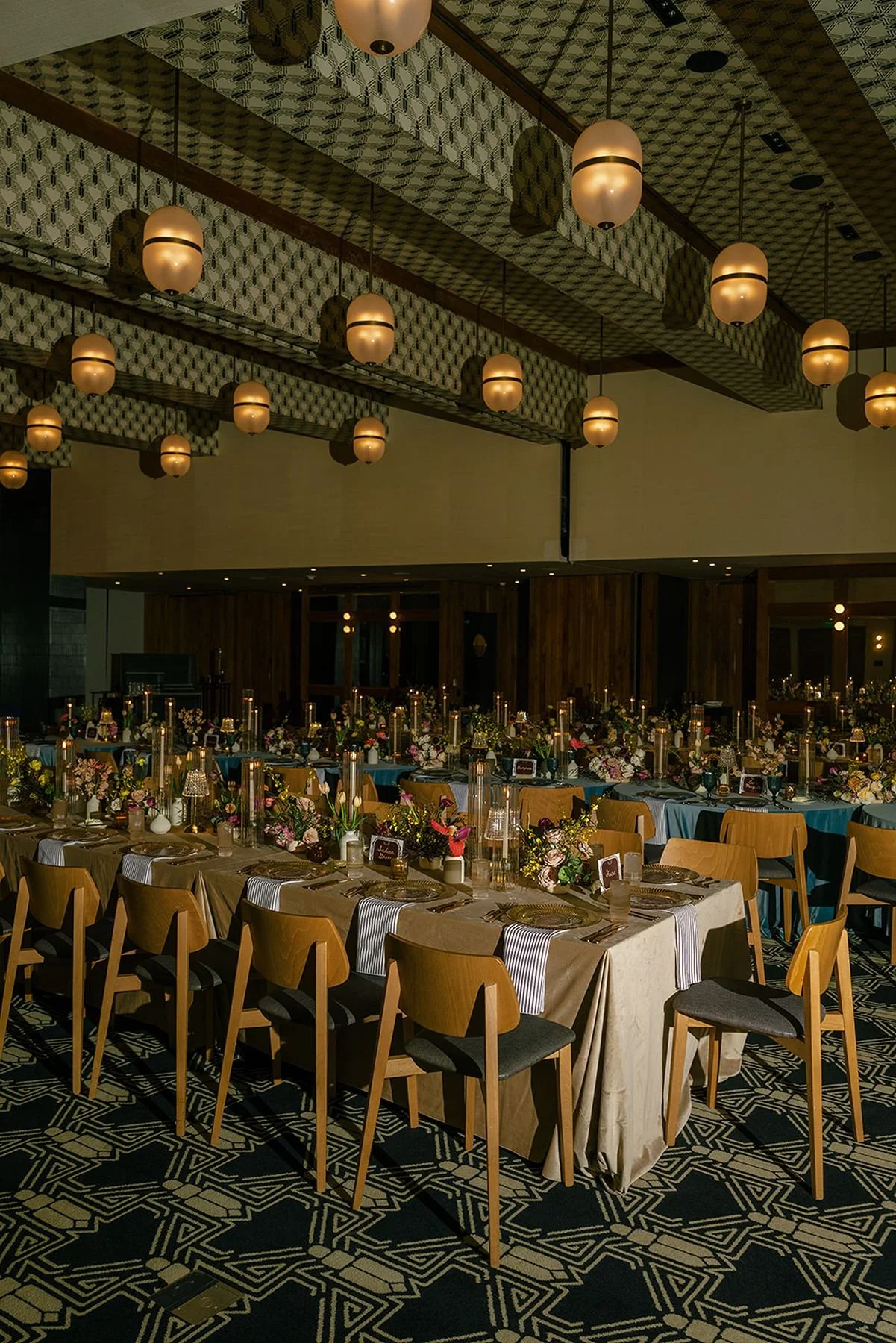 Mid century modern wedding design with creams, blues, warm tones for a swanky, speakeasy vibe at Austin Proper Hotel in Austin Texas