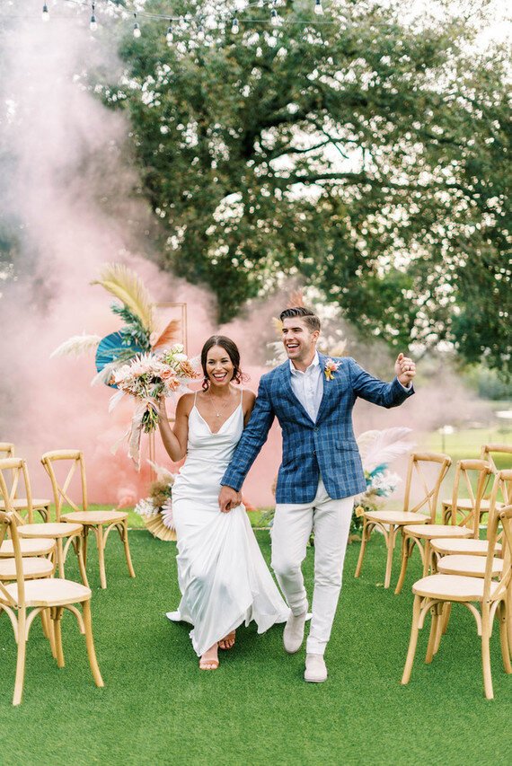 pink+smoke+bomb+wedding+ceremony+exit+by+houston+wedding+planners+epoch+co.jpeg