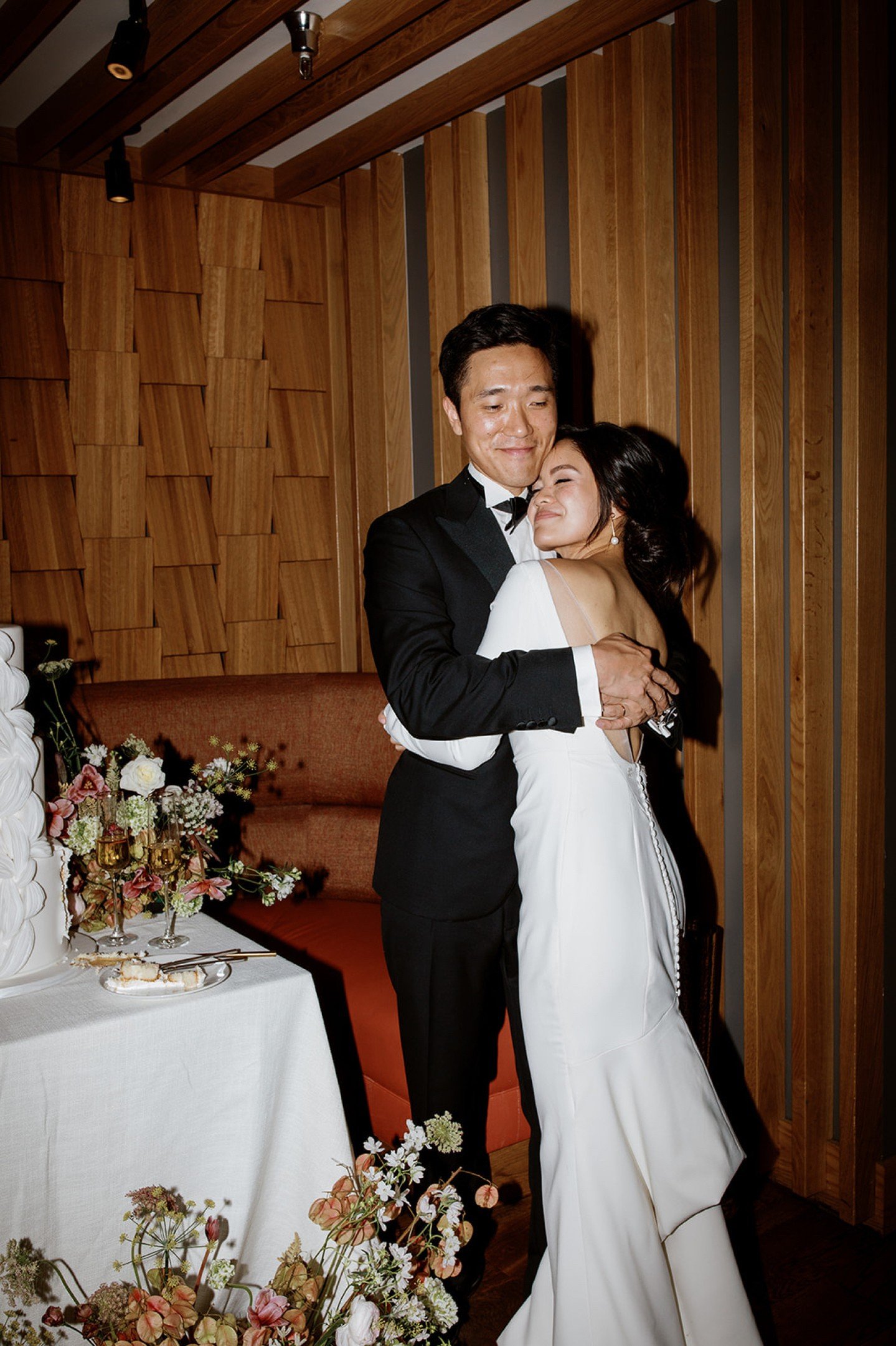 Sure, it&rsquo;s tradition. But this wasn&rsquo;t just &ldquo;cut the cake and smile for the camera.&rdquo;
This was you two, The way you squeeze each other a little tighter, laugh a little louder, and let yourselves feel it all.
The florals were lus