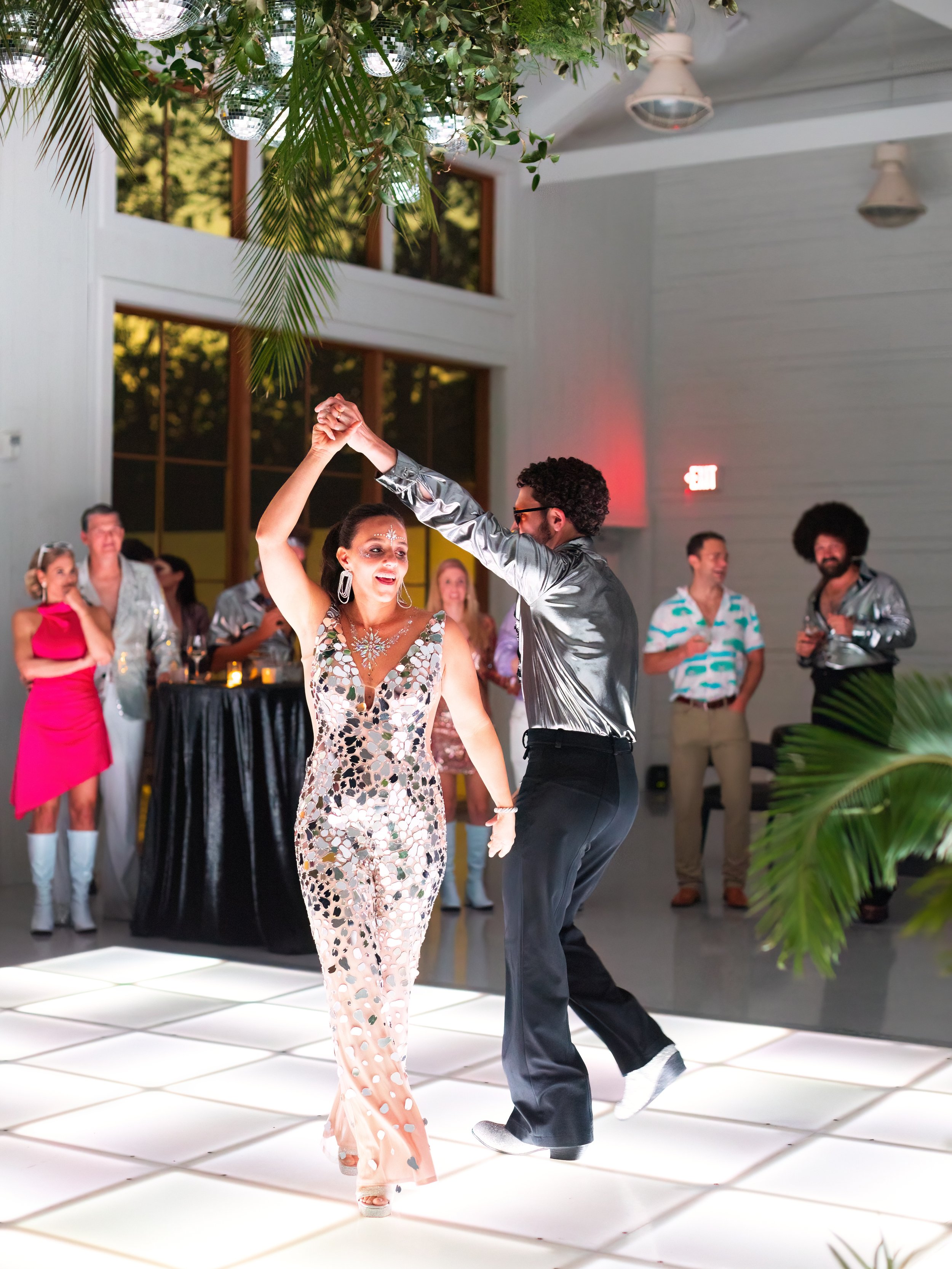 Disco Wedding Theme fun couple attire on LED dance floor | Unique Wedding planner Epoch