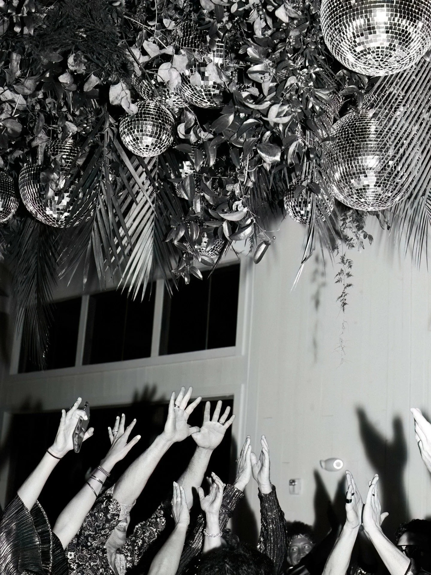 Every millennial knows what happens when the DJ plays that song.
Hands go up.
And they stay there.
Studio 54 glow. Disco balls spinning. A room designed for pure, collective serotonin.

After-parties are where everyone finally exhales.
The energy shi