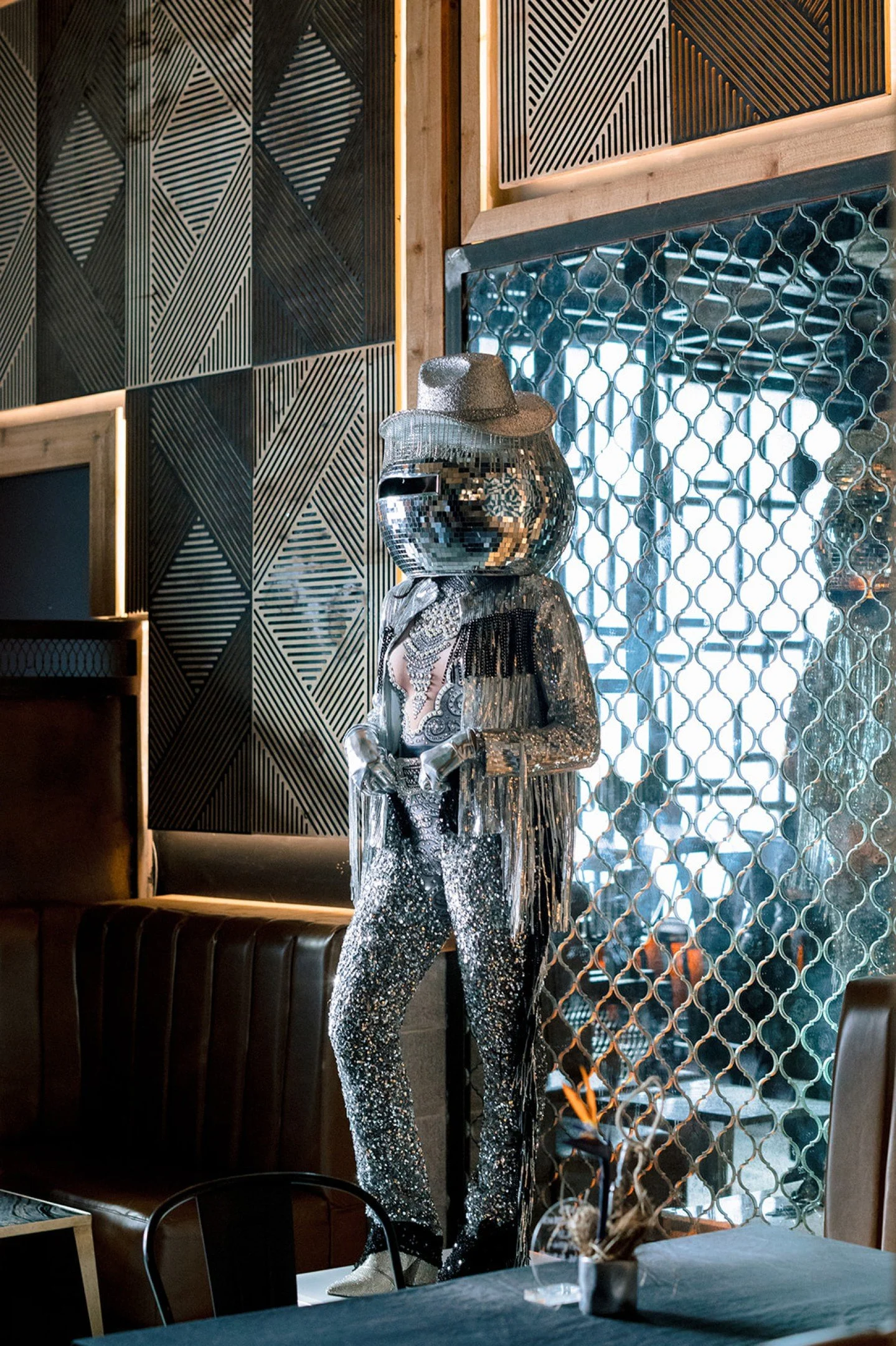 Designing an event isn&rsquo;t about *just* adding moments.
It&rsquo;s about deciding which ones matter.

Disco diva cowgirls welcoming guests, placed to pull people into the room.
Passed welcome drinks that keep the energy moving and avoid wasting t