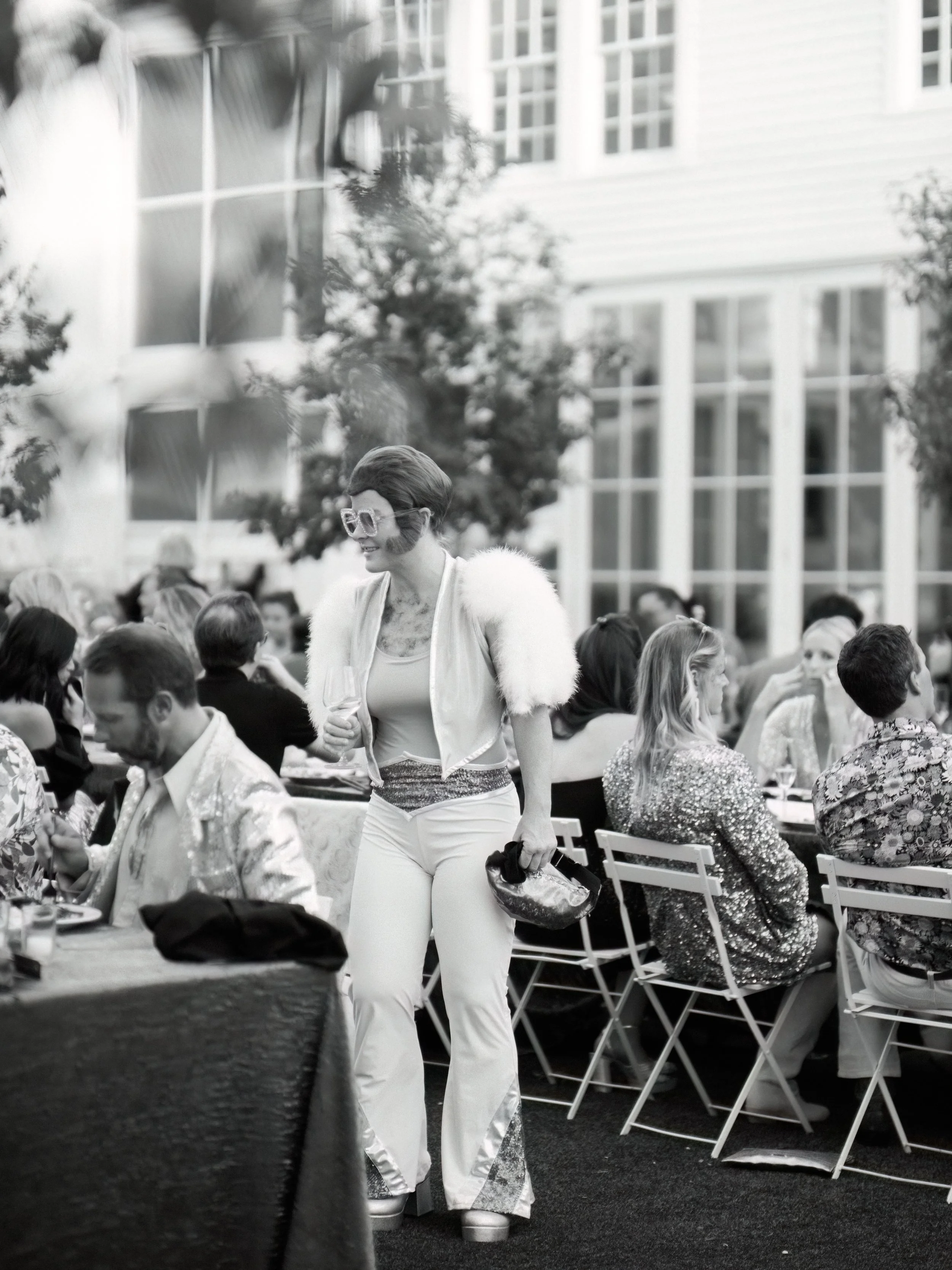 Elton John Costume at '70s-Themed wedding with Studio 54 vibe in Austin | Fun wedding planners Epoch Events