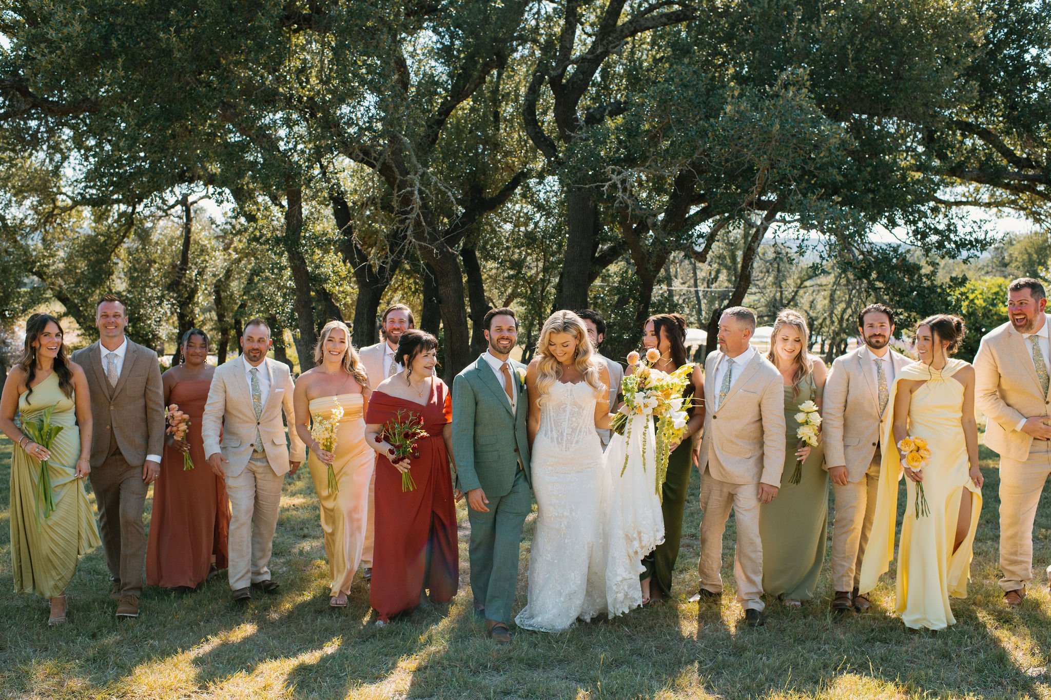 Wedding party in colorful mismatched attire walking outdoors — vibrant Gen Z color palette with personality