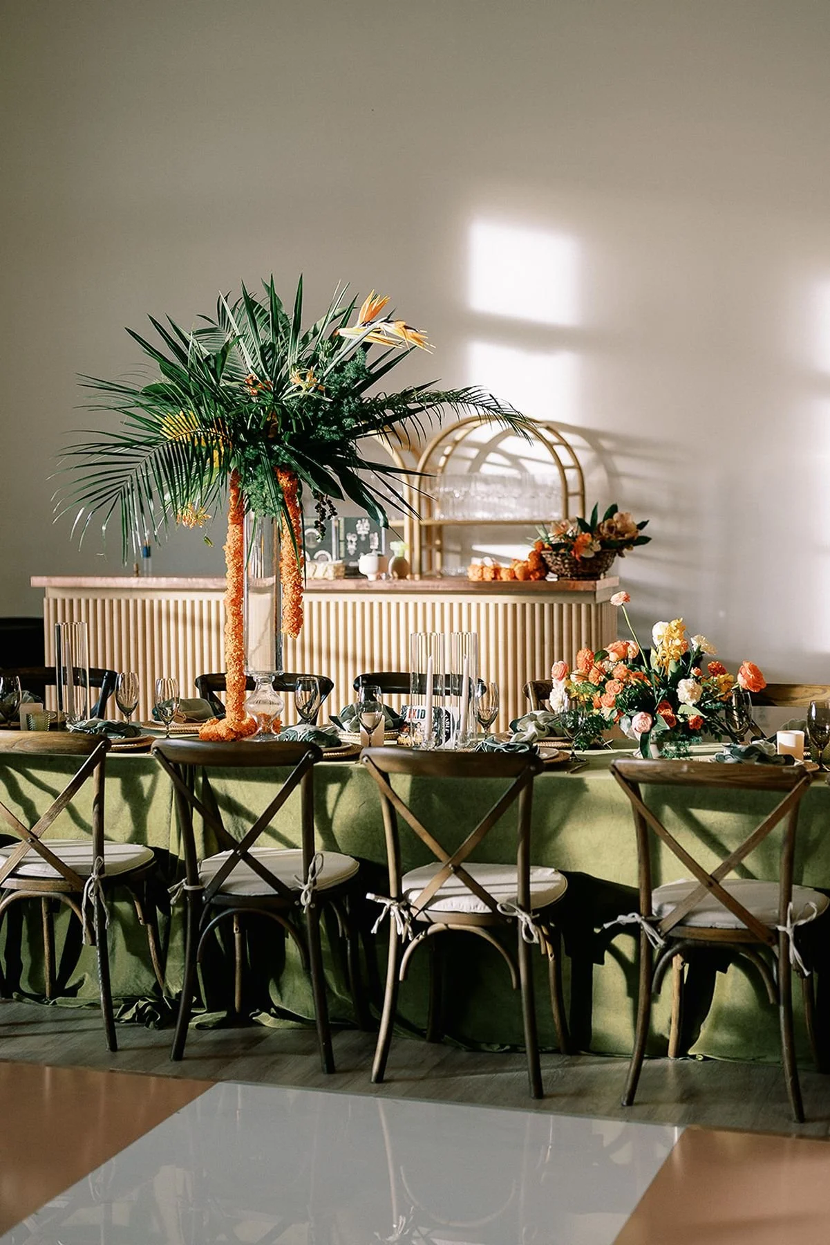 Checkered dance floor and modern wedding details with tropical and marigold strands - fluted bar 