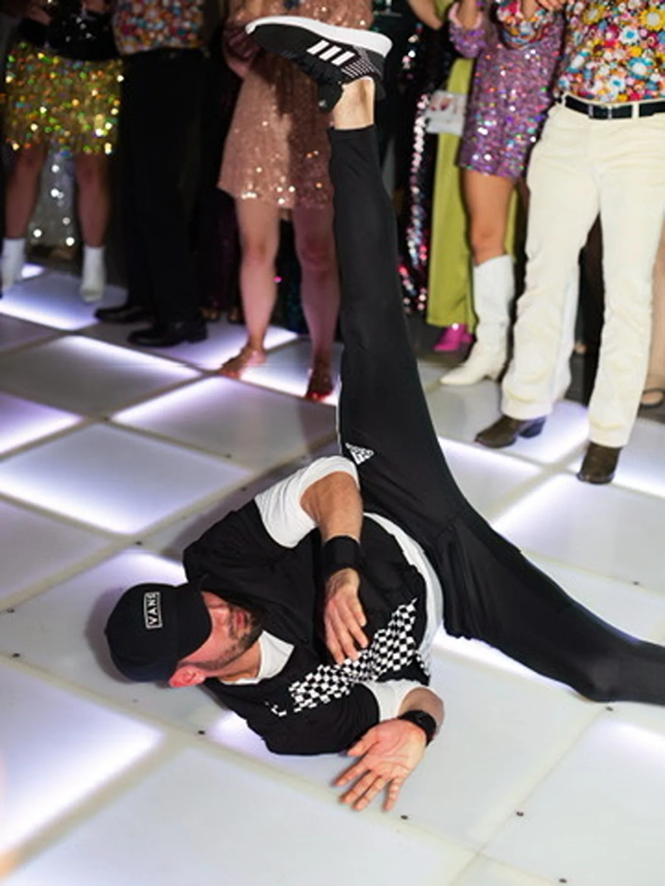 Breakdancer at a Wedding with an LED Dance Floor and Studio 54 Theme from Cool Wedding Planner near me Epoch Co