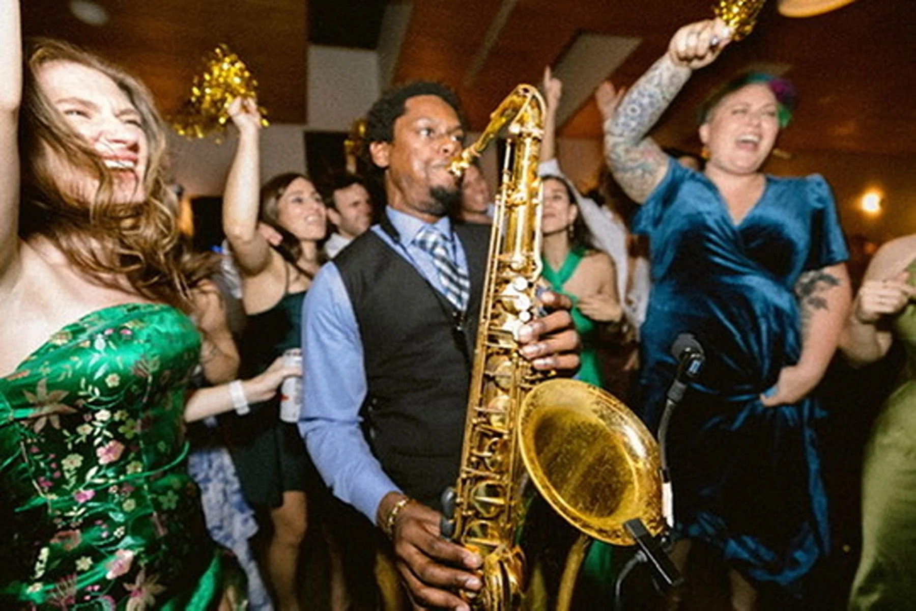 Epic Party Vibes with a Saxophone on the Dance Floor at Austin wedding from Epoch Events