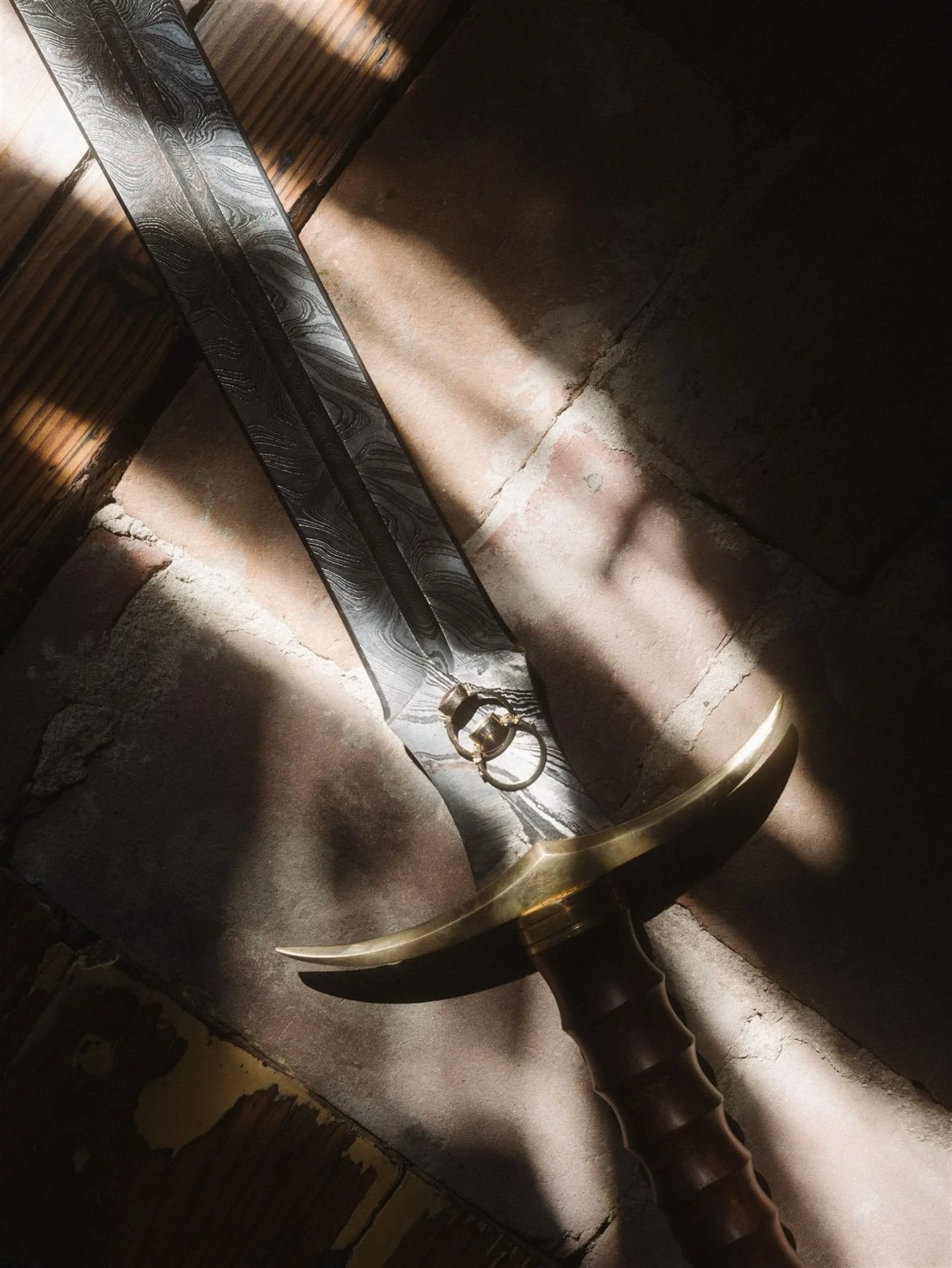 Gen z couples love of dungeons and dragons brought their D&D sword for cake cutting