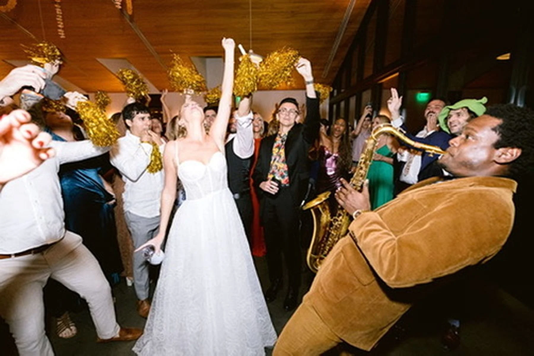 Saxophone Party Vibe on the Dance Floor at 70s-inspired Wedding by Unique Wedding Planners Epoch