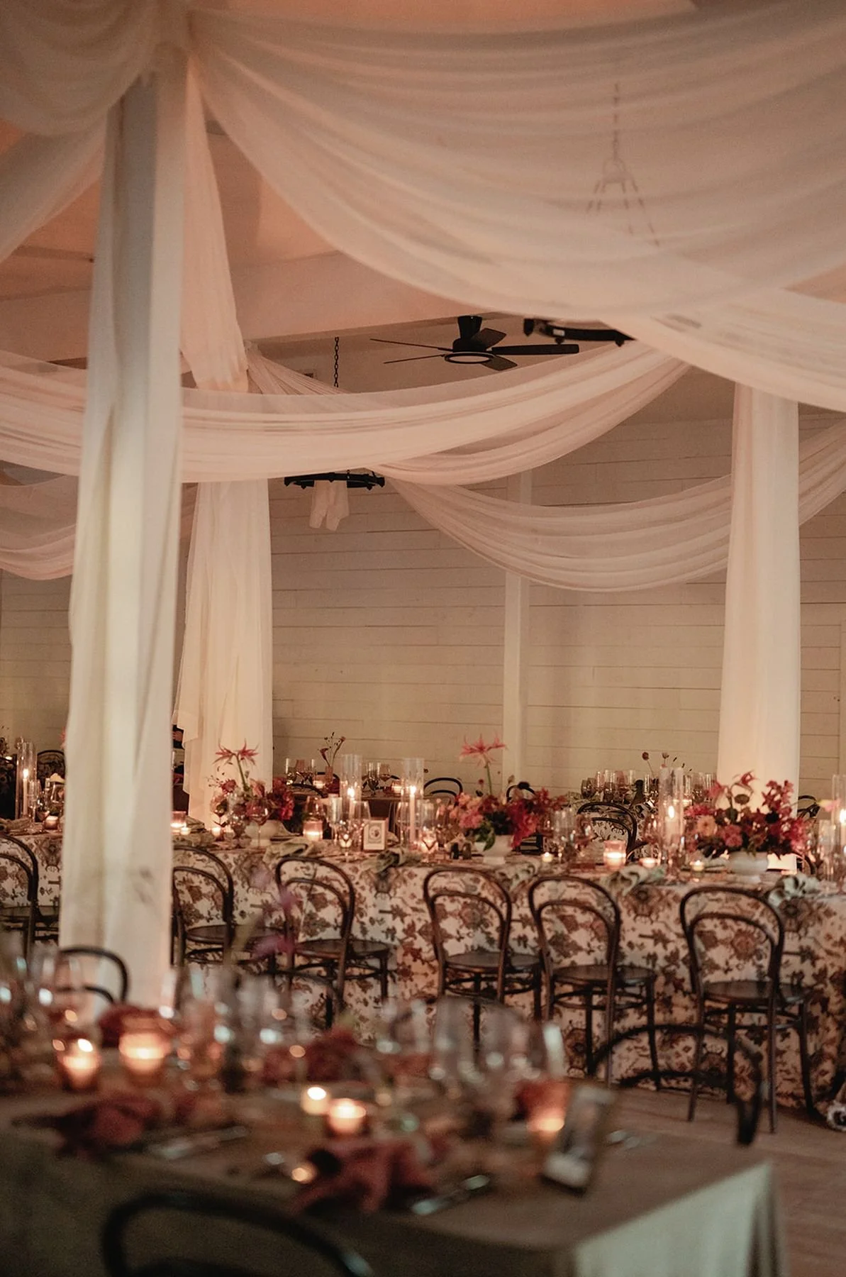 Luxury tablescape at Contigo Ranch, a Fredericksburg TX wedding venue with candlelight and seasonal florals.