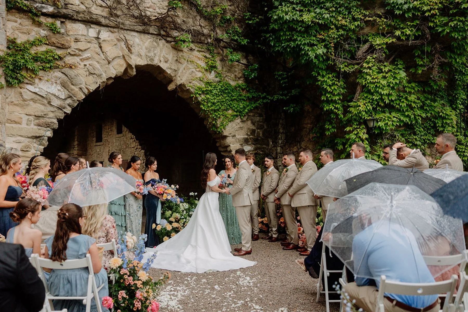 Outdoor Ceremony in the Rain at La Baronia by destination wedding planner near me Epoch Events