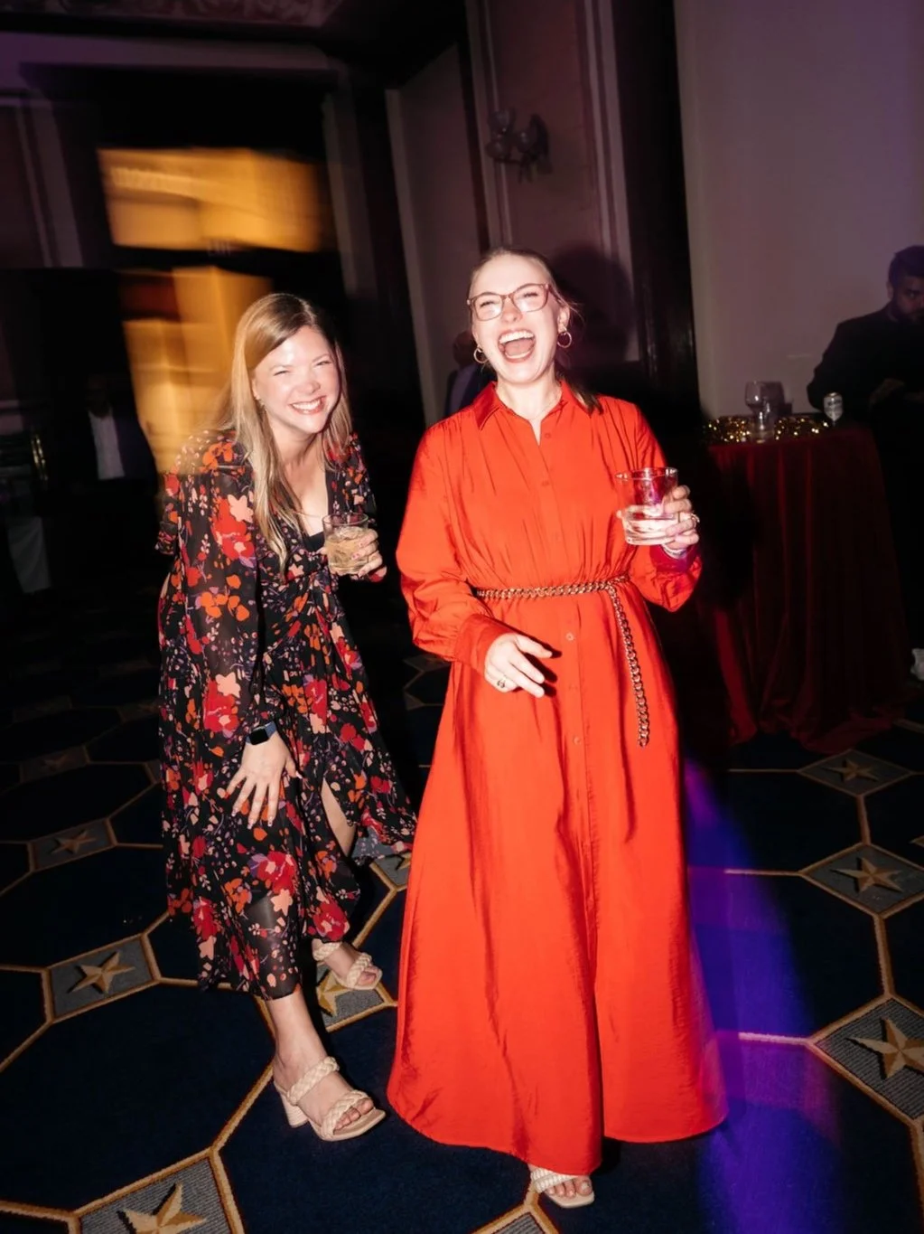 Texas destination wedding planners laughing at a reception