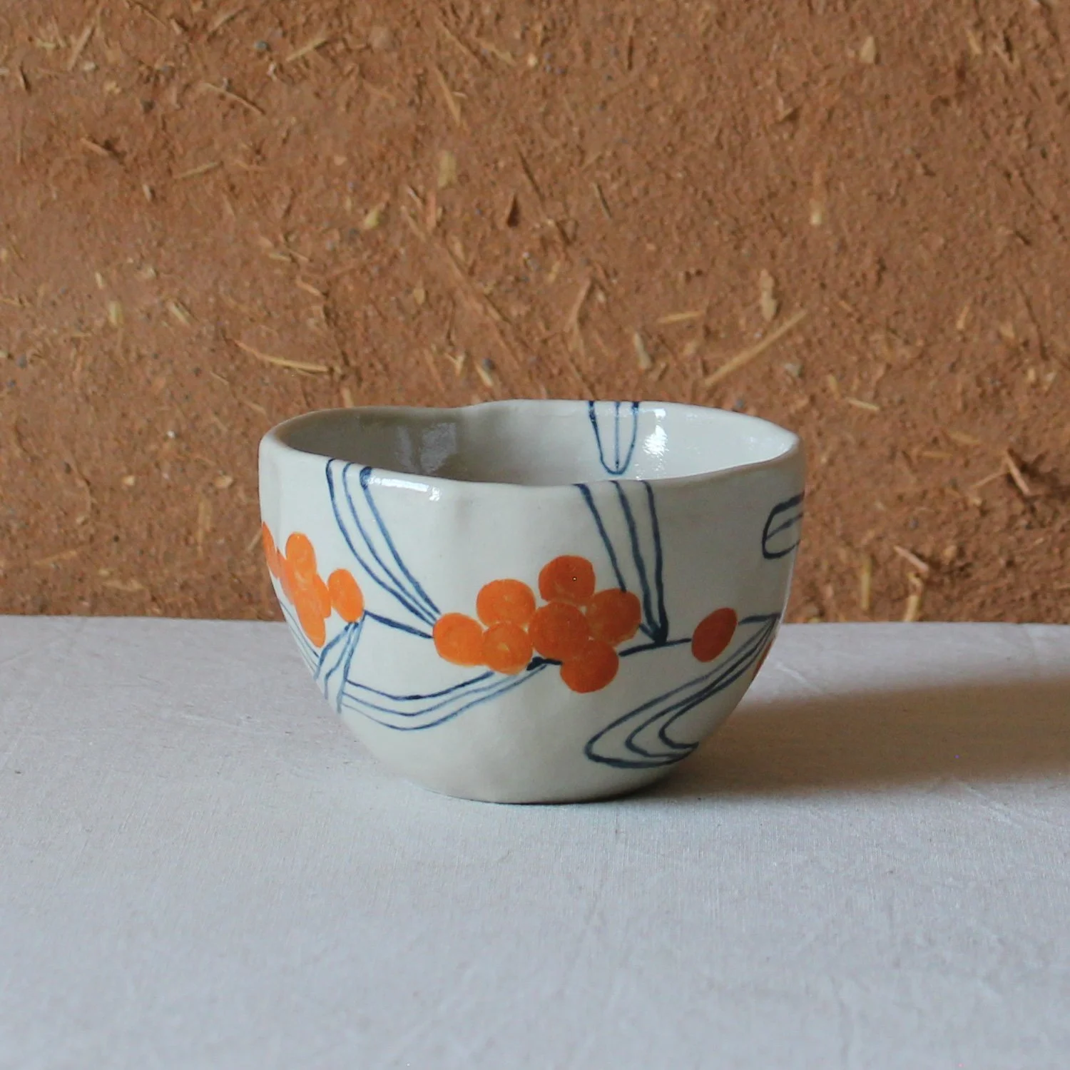petit-bol-gres-peinture-argousier-filet-bleu-orange-nanteau-sur-lunain.jpg