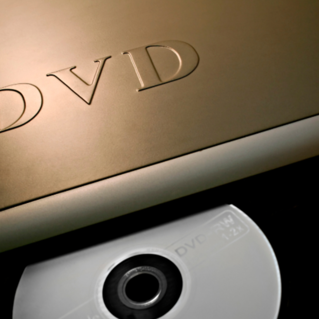 Close-up of a DVD writer with a disc partially inserted