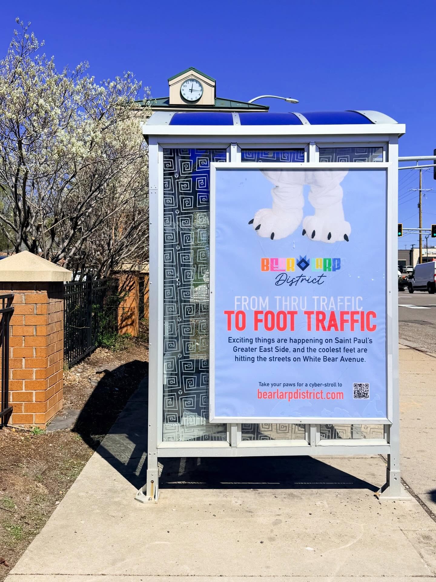 @redmoodmarketing and @d2greatereastside are taking a PAWS on this beautiful Friday to celebrate newly installed @metrotransitmn bus stop signage in @officialcityofsaintpaul&rsquo;s Greater East Side to help launch the @bear_larp District campaign, #