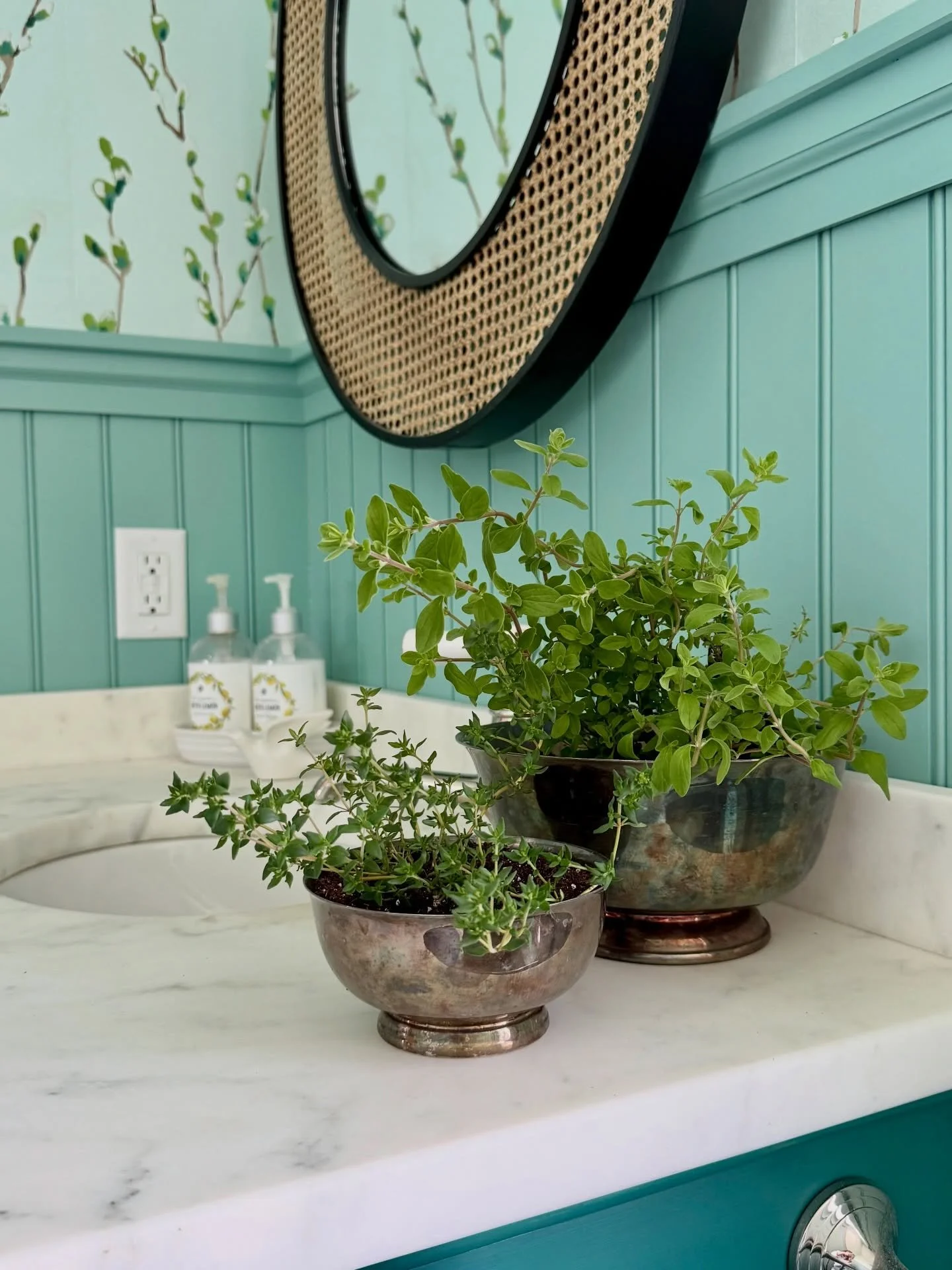 Remember when I shared that post about upcycling antique silver for a spring centerpiece? Still doing it. Still love it!

These little silver bowls are planted with marjoram and thyme and live in my springy pussy willow powder room where they smell f