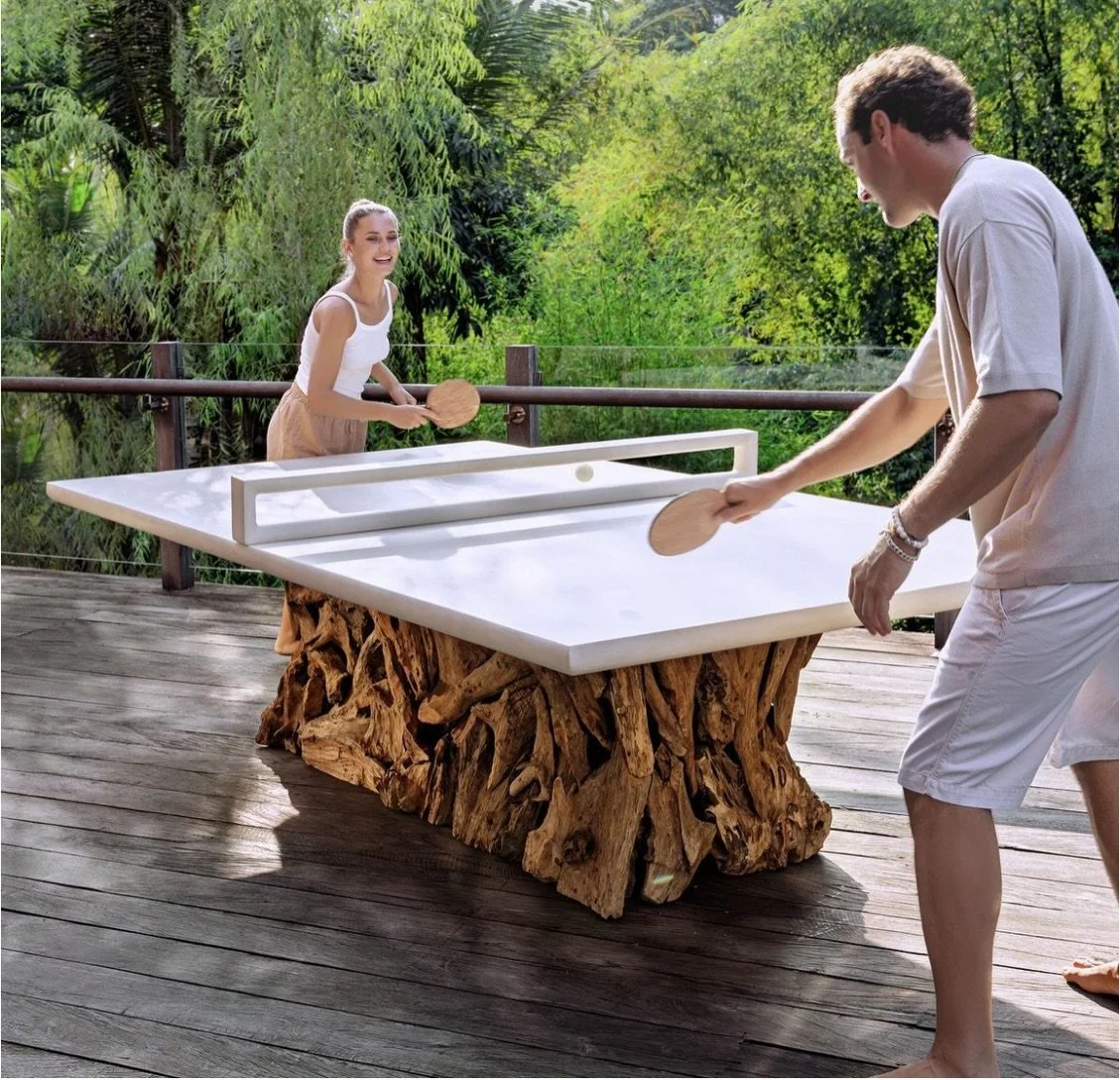 Al fresco at 7&ndash; then it&rsquo;s ping pong, GAME ON!🏓

This might just be the most functional and fun piece of outdoor furniture I have ever seen. 

Crafted from a lightweight GRC top and natural teak roots pieced together by hand, this outdoor