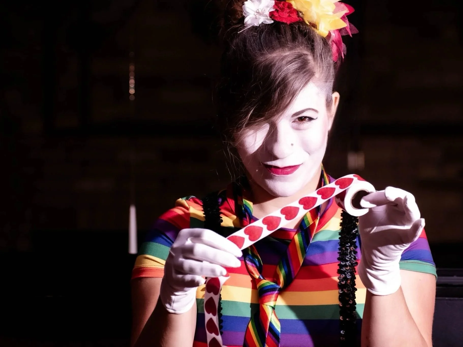 Cute mime in colourful rainbow attire