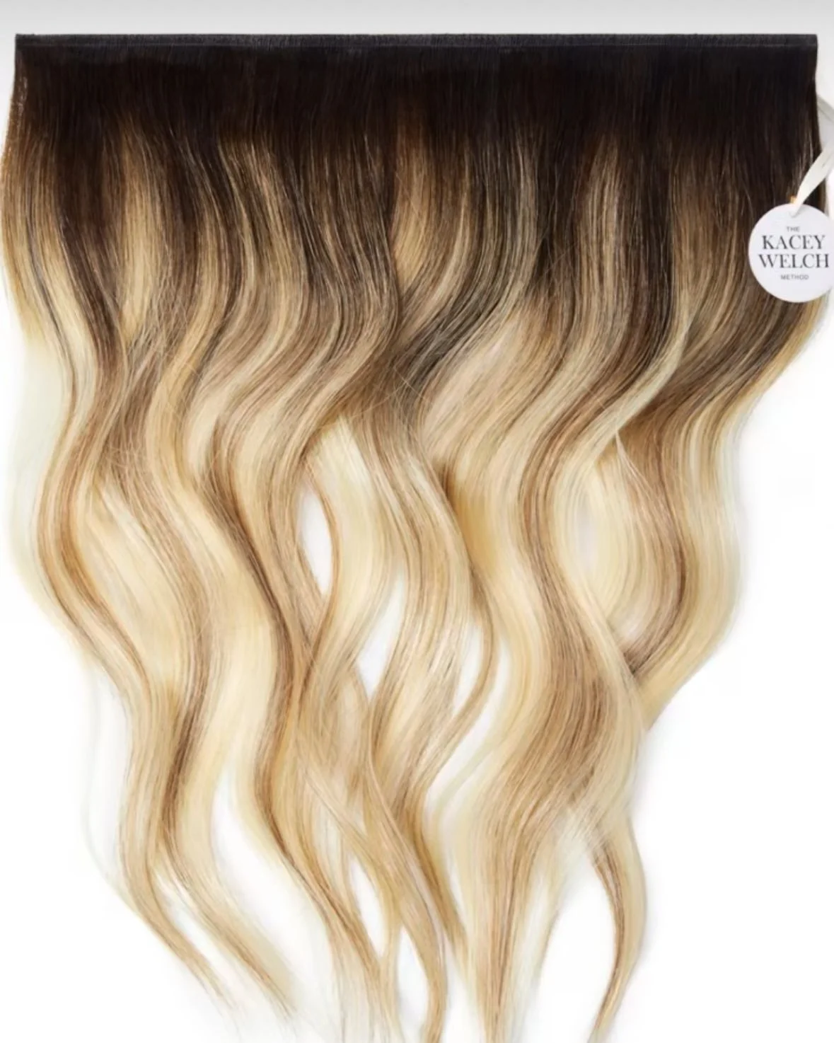 Blonde ombré hair extension.