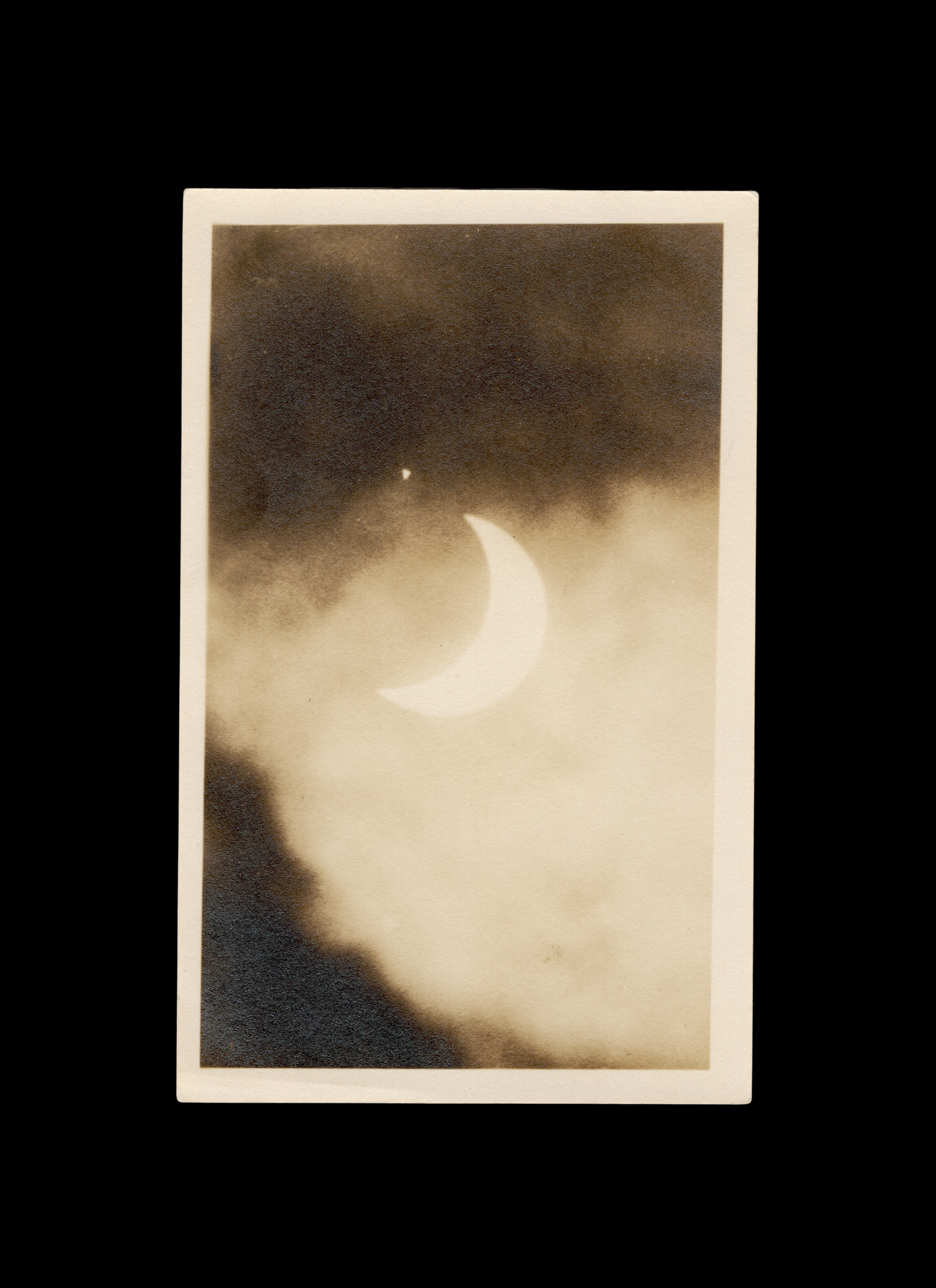 Solar Eclipse Amongst Dark Clouds, Real-Photo Postcard, c. 1905