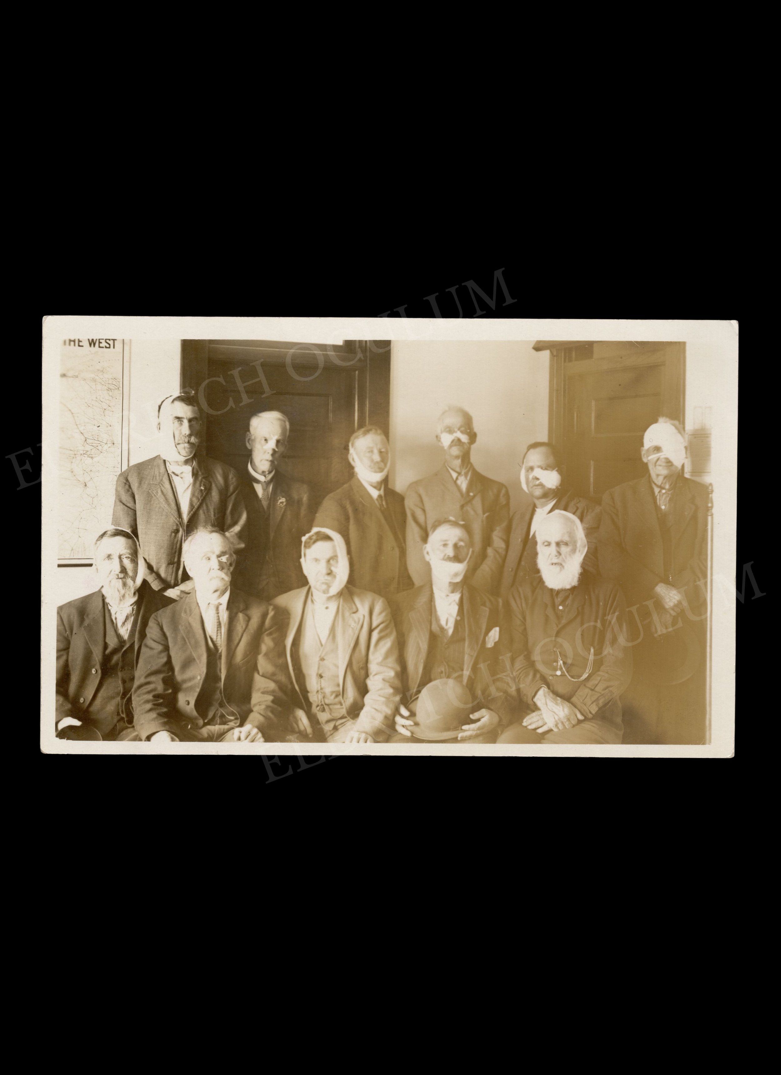 11 Men with Bandaged Head Wounds, Real-Photo Postcard, c. 1910