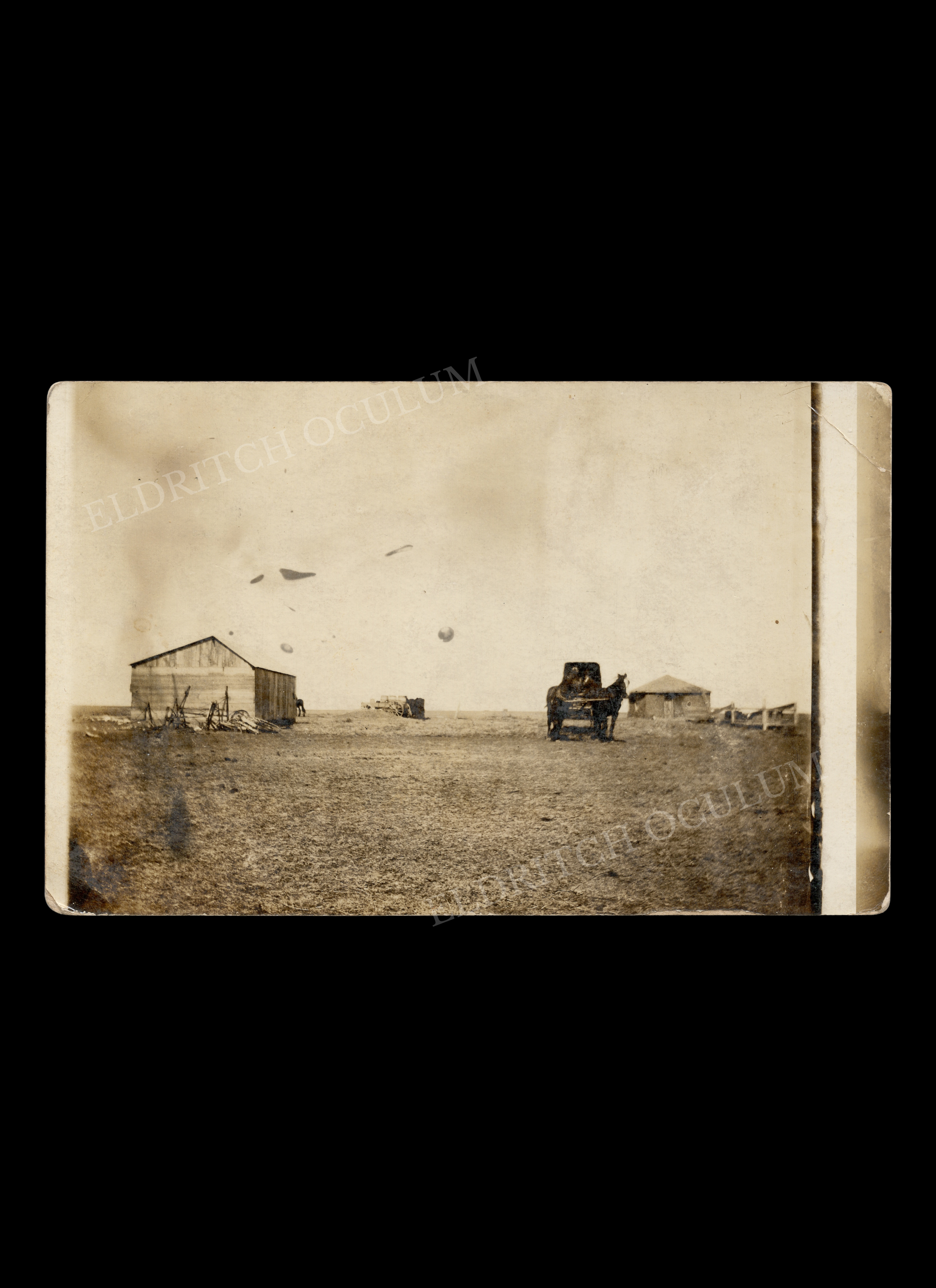 UFO’s over Farm on Sparse Landscape, real-photo postcard, c. 1908