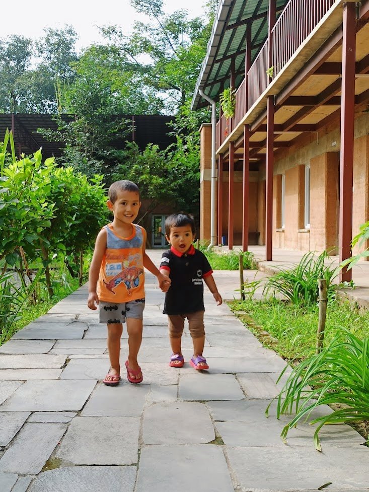 BlinkNow Kopila Valley children walking down pathway