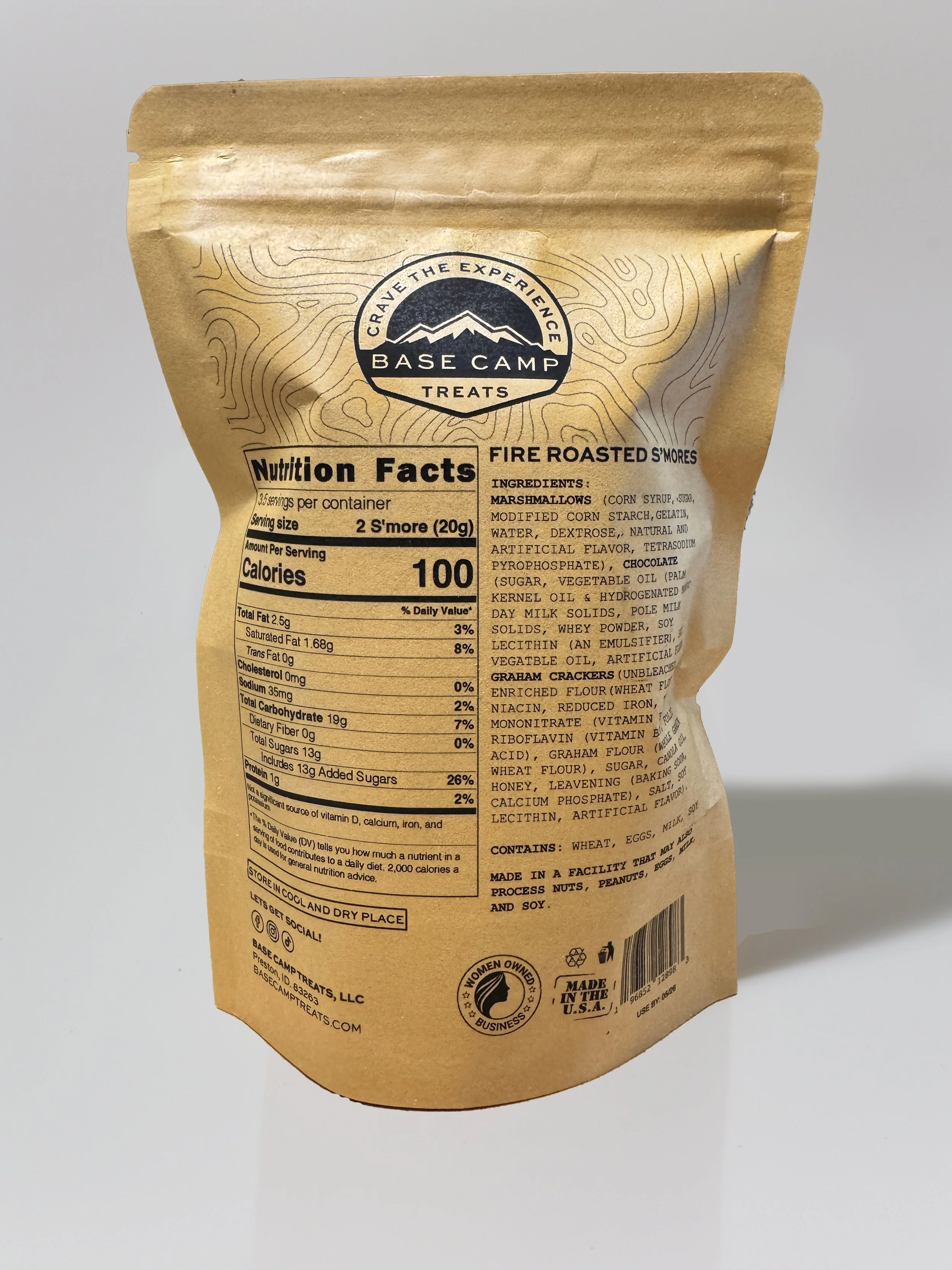 Back of Base Camp Treats Freeze Dried Fire Roasted S’mores bag showing nutrition facts, ingredients, and kraft packaging.