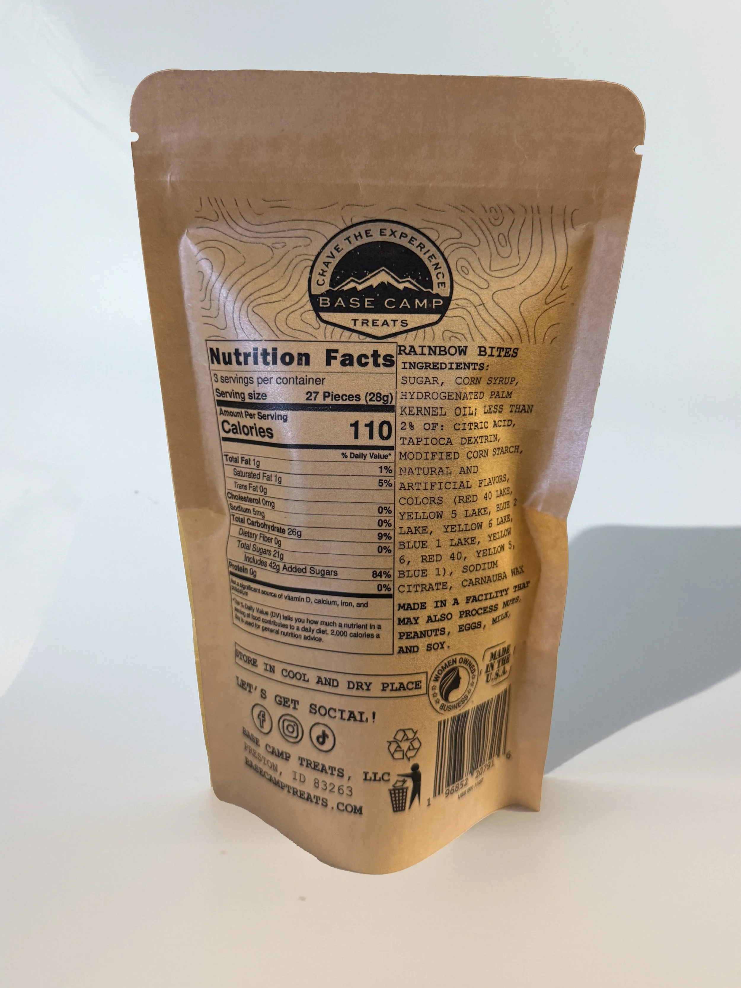 Back of Base Camp Treats Freeze Dried Skittles bag showing nutrition facts, ingredients, and kraft packaging design