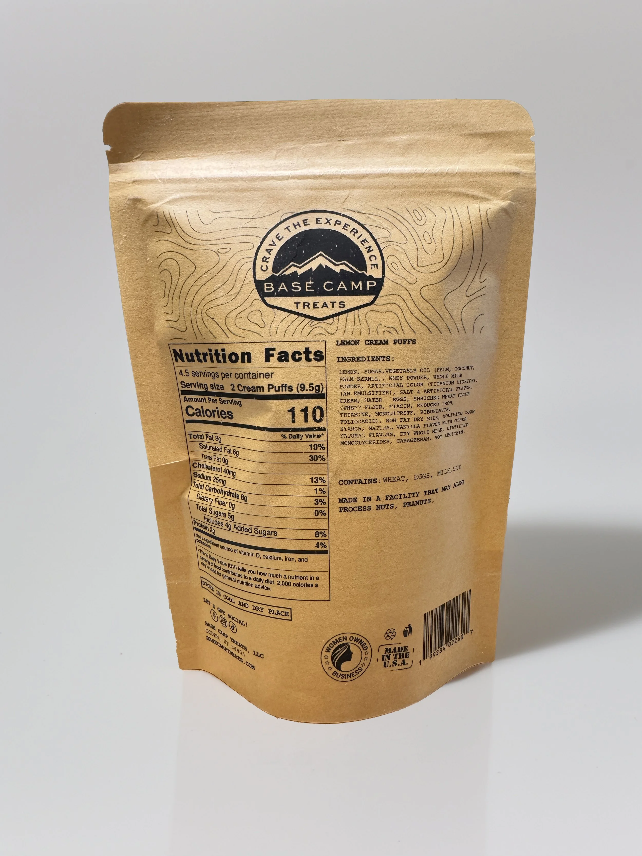 Back of Base Camp Treats Freeze Dried Lemon Cream Puffs bag showing nutrition facts, ingredients, and kraft packaging.