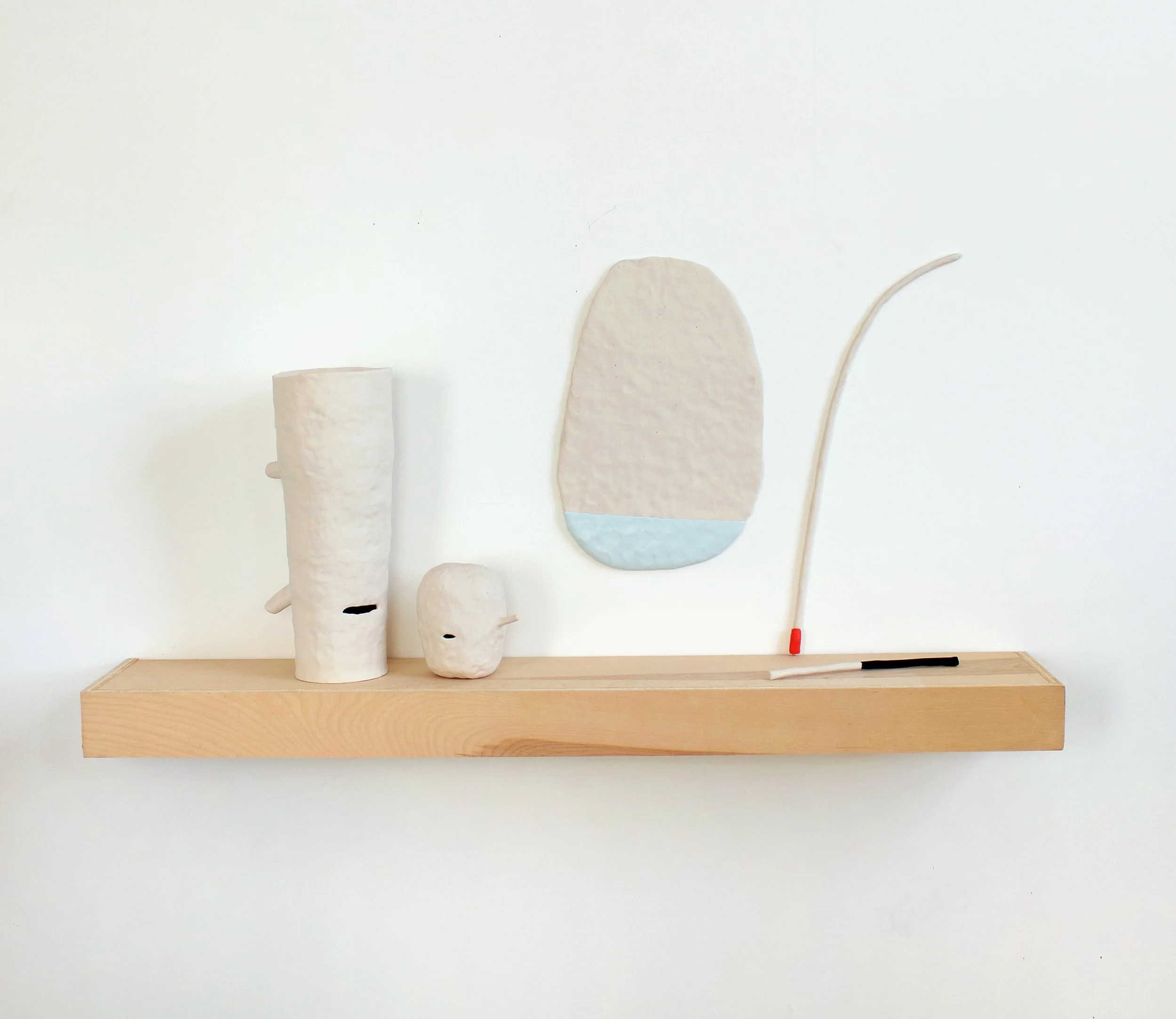   An alphabet of makeshift days (Tendering)  Porcelain, thermoplastic clay, flashe, wood 19” x 36” x 7”  