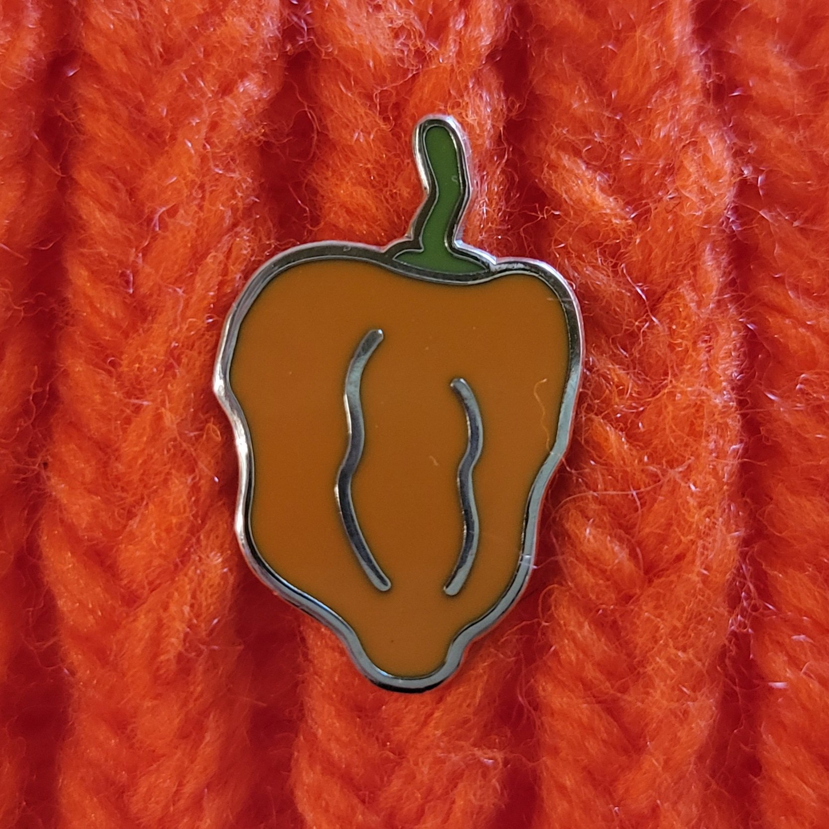 ORANGE PEPPER on orange background.jpg