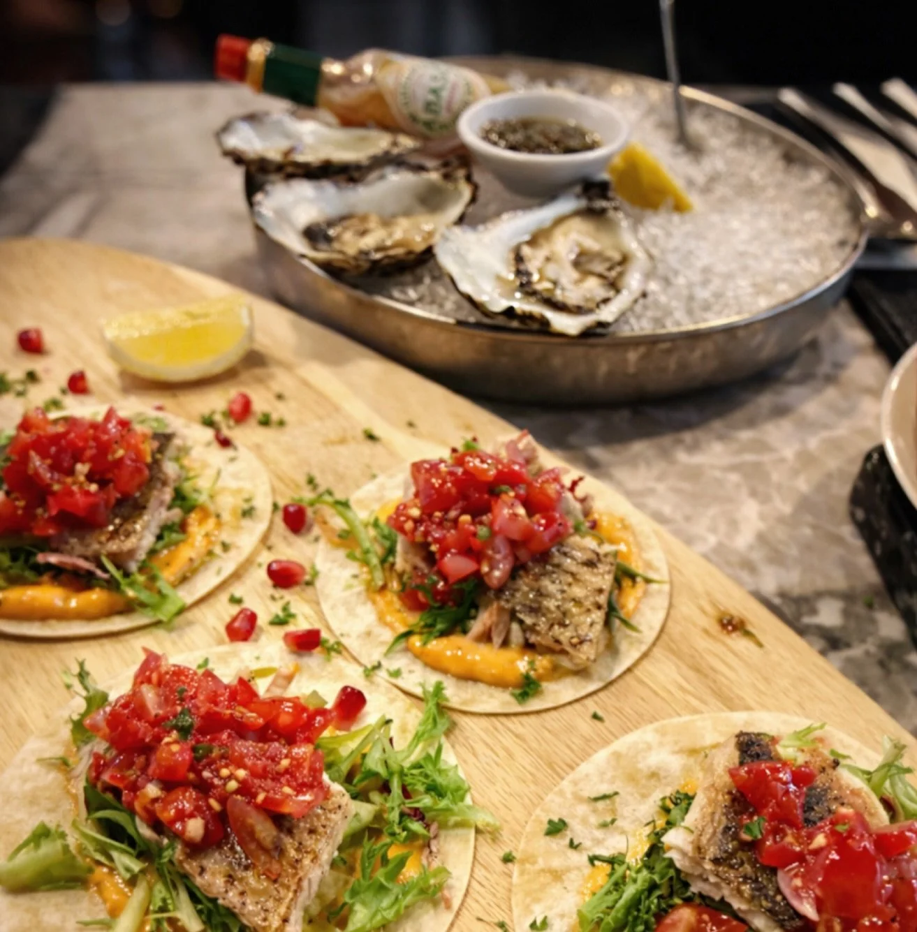 Fresh, zesty, and straight-up irresistible 🌮✨ 
Our signature fish tacos&mdash;crispy, juicy, loaded with vibrant salsa&mdash;paired with a briny Irish oyster trio that tastes like the ocean in its purest form 🦪🍋 

One bite and you&rsquo;ll know wh