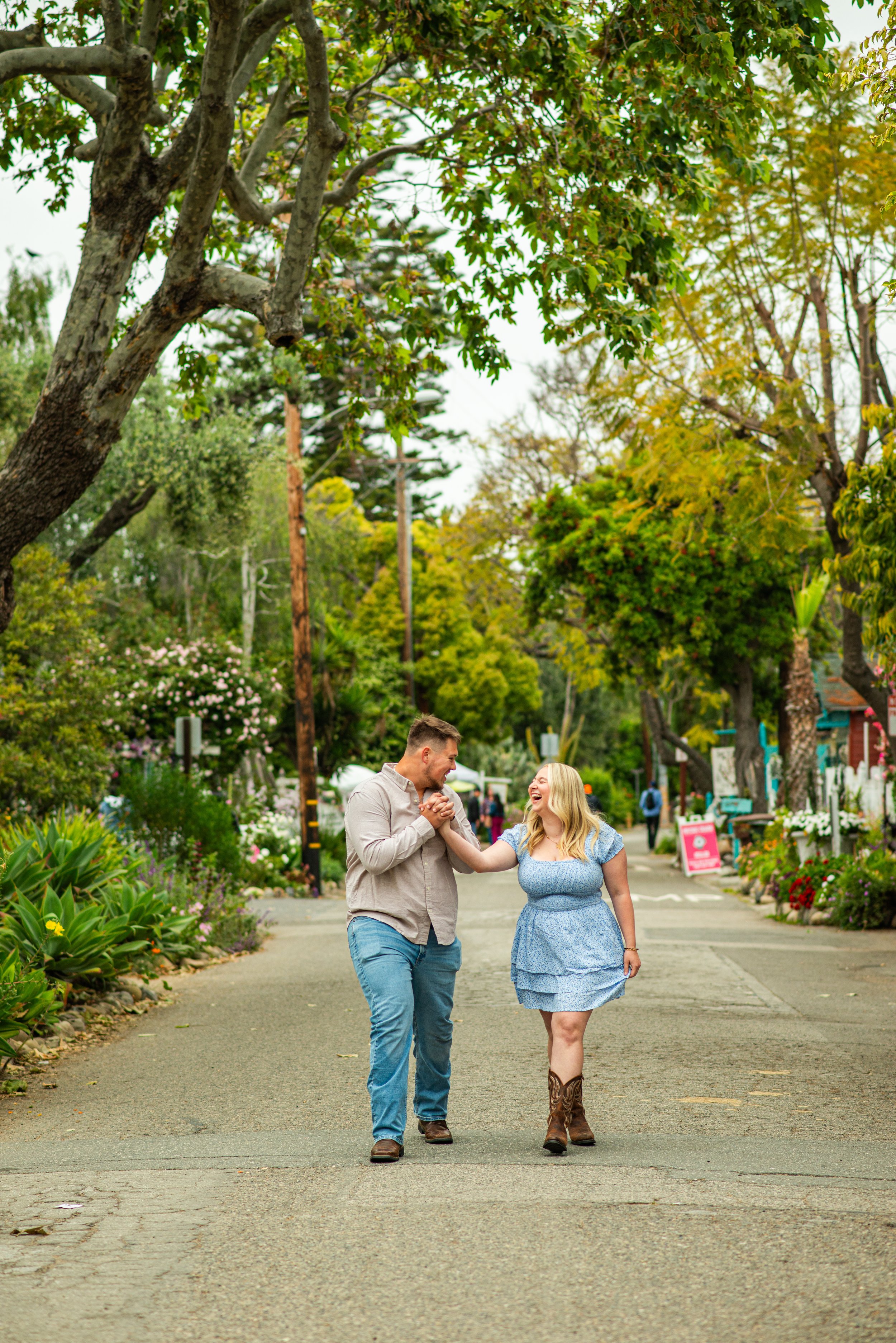 Candid photo of Couple walking together at San Juan train station