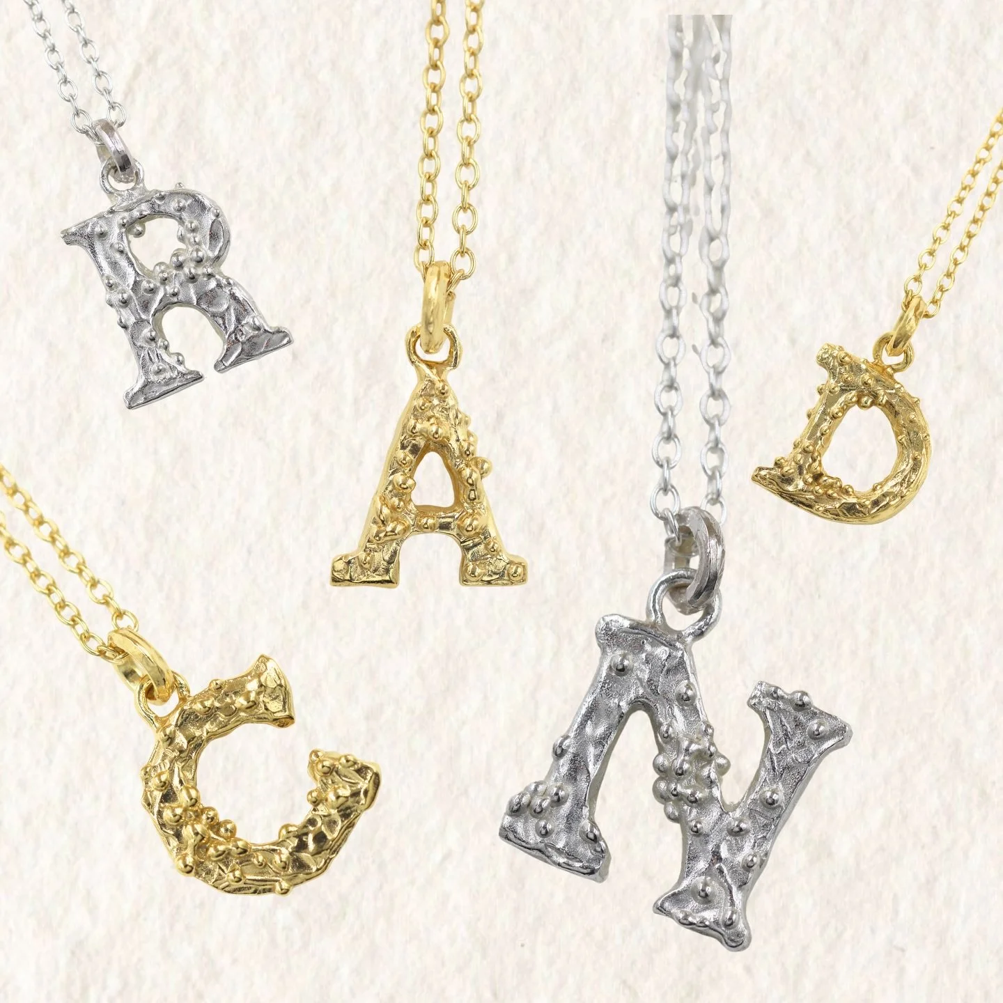 Love Letters 💫 Now available online. I love making these sweet little pendants. Each letter has been hand crafted with a unique molten texture and adorned with clusters of organic granulation, in an ethereal but classic script.

Options of sterling 