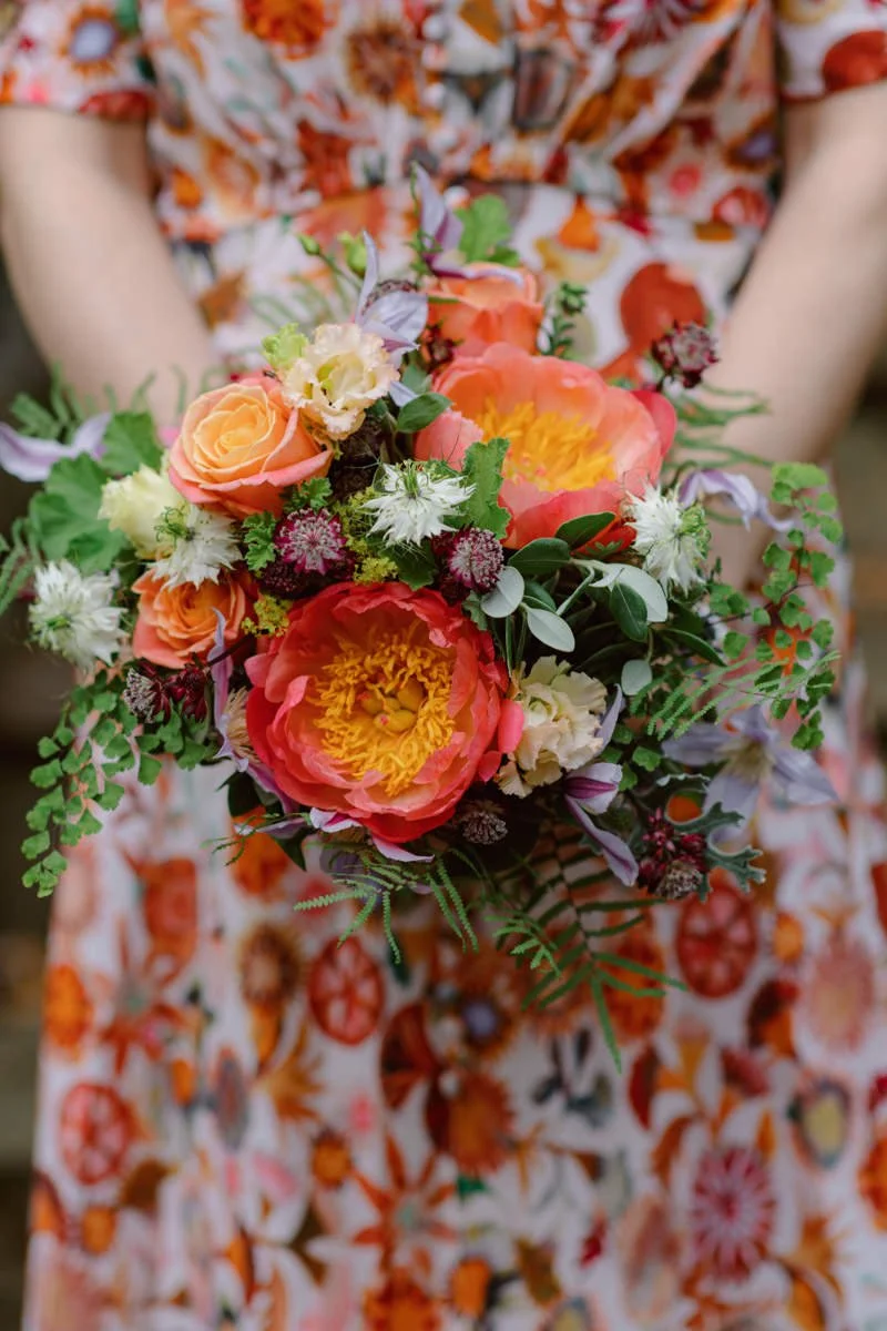 Colourful bridesmaid bouquet at a wedding in Petworth